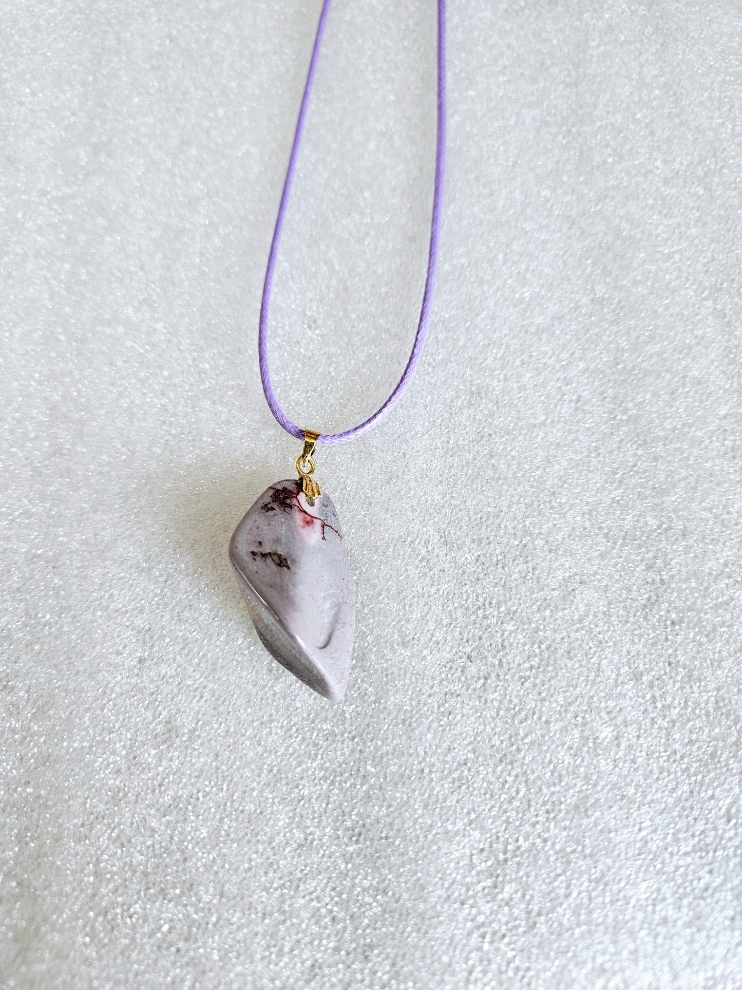 Experience the stunning natural beauty of our Desert Jasper Pendant. With its unique polychrome patterns and hues, this pendant is truly one-of-a-kind.