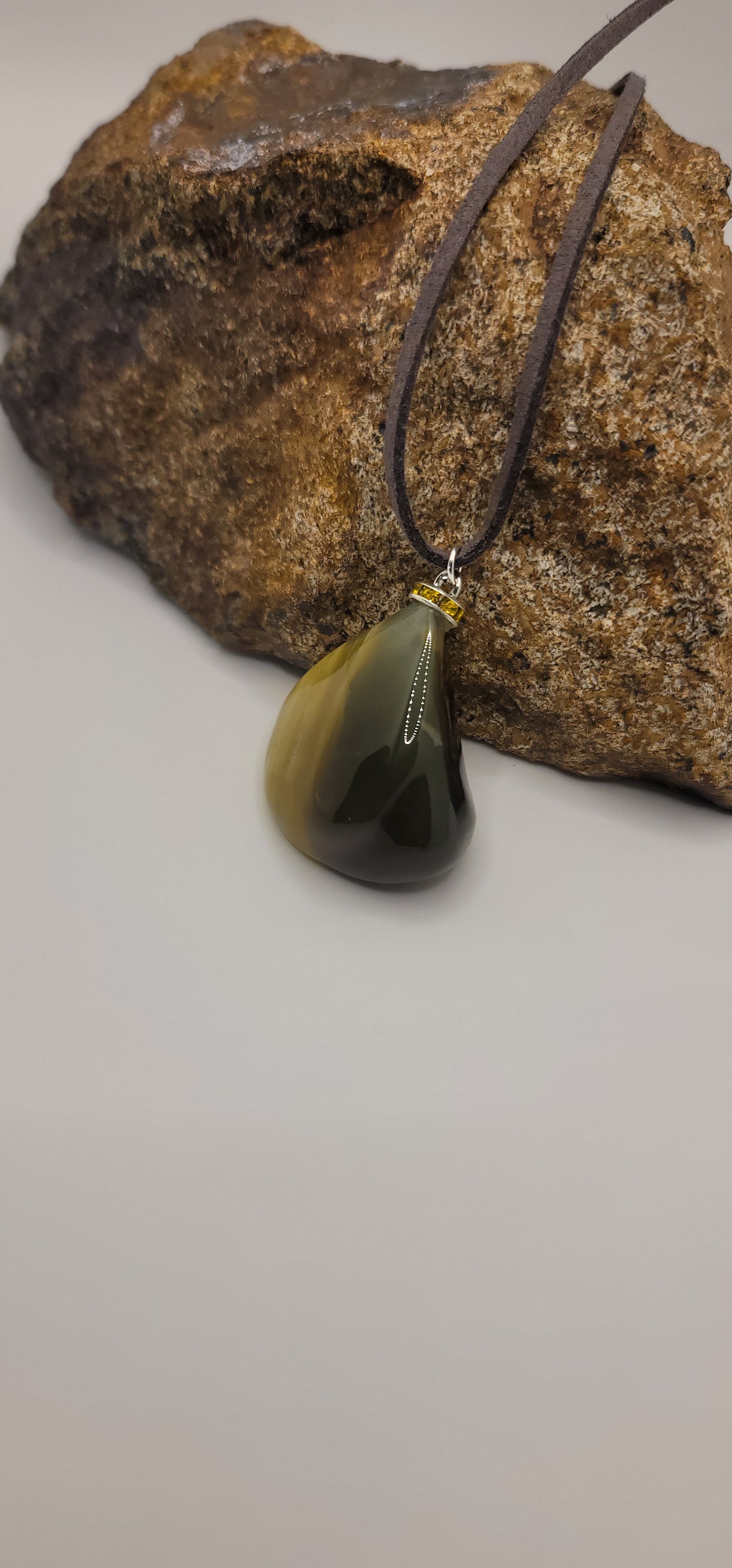 Unique dual colored striped agate. Uniquely beautiful multi-green pendant that is perfect for any occasion or as a great gift for someone special!