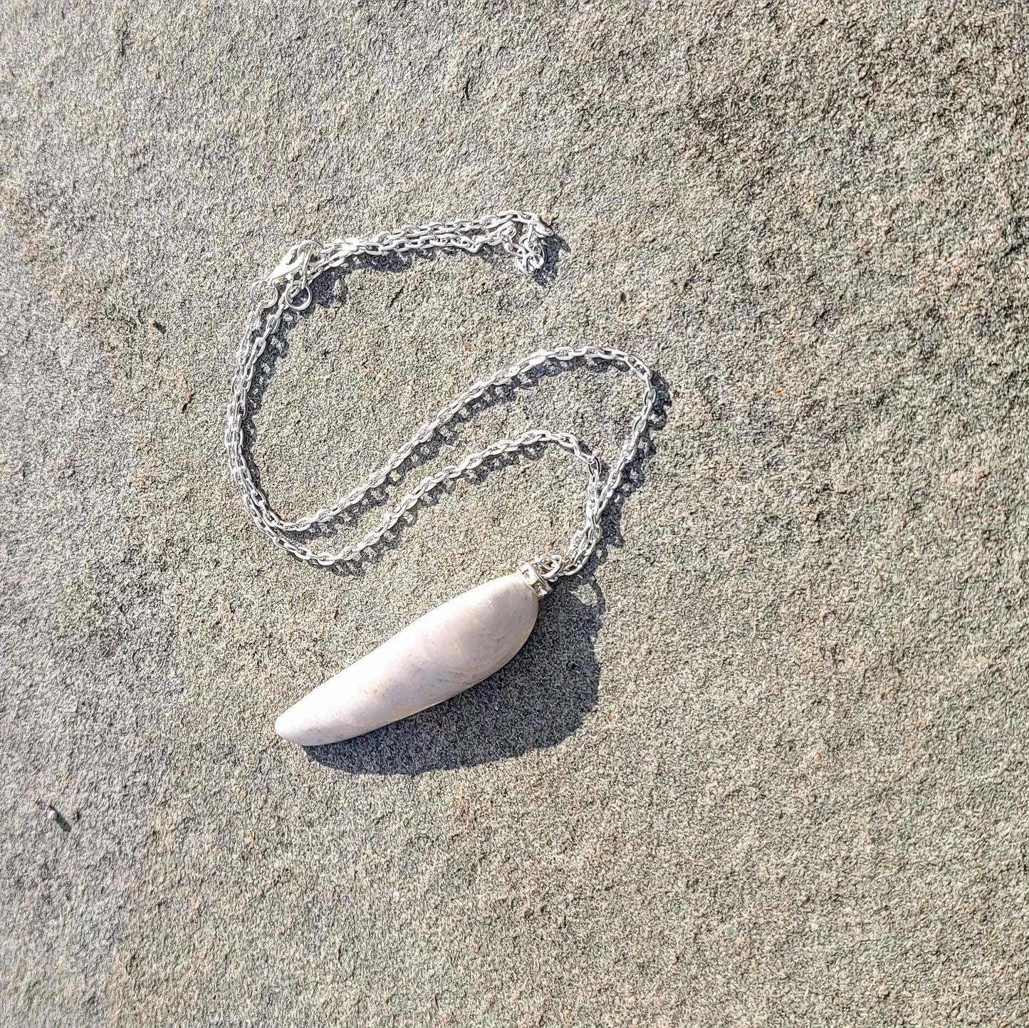 BOLD & BEAUTIFUL WHITE & CLEAR QUARTZ PENDANT.