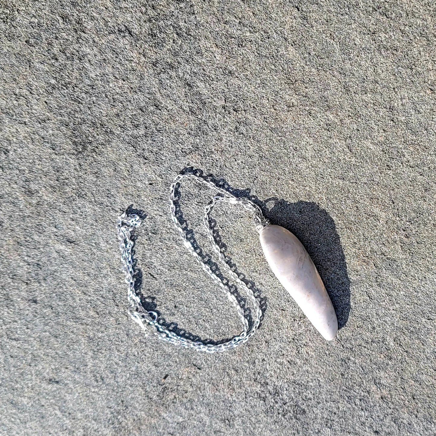 BOLD & BEAUTIFUL WHITE & CLEAR QUARTZ PENDANT.