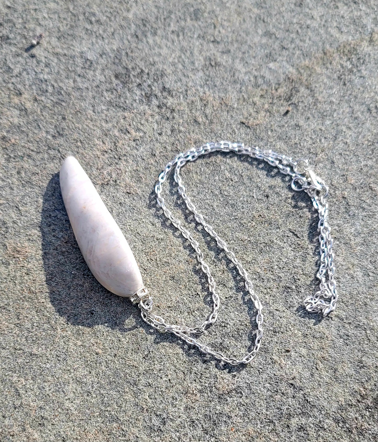 BOLD & BEAUTIFUL WHITE & CLEAR QUARTZ PENDANT.