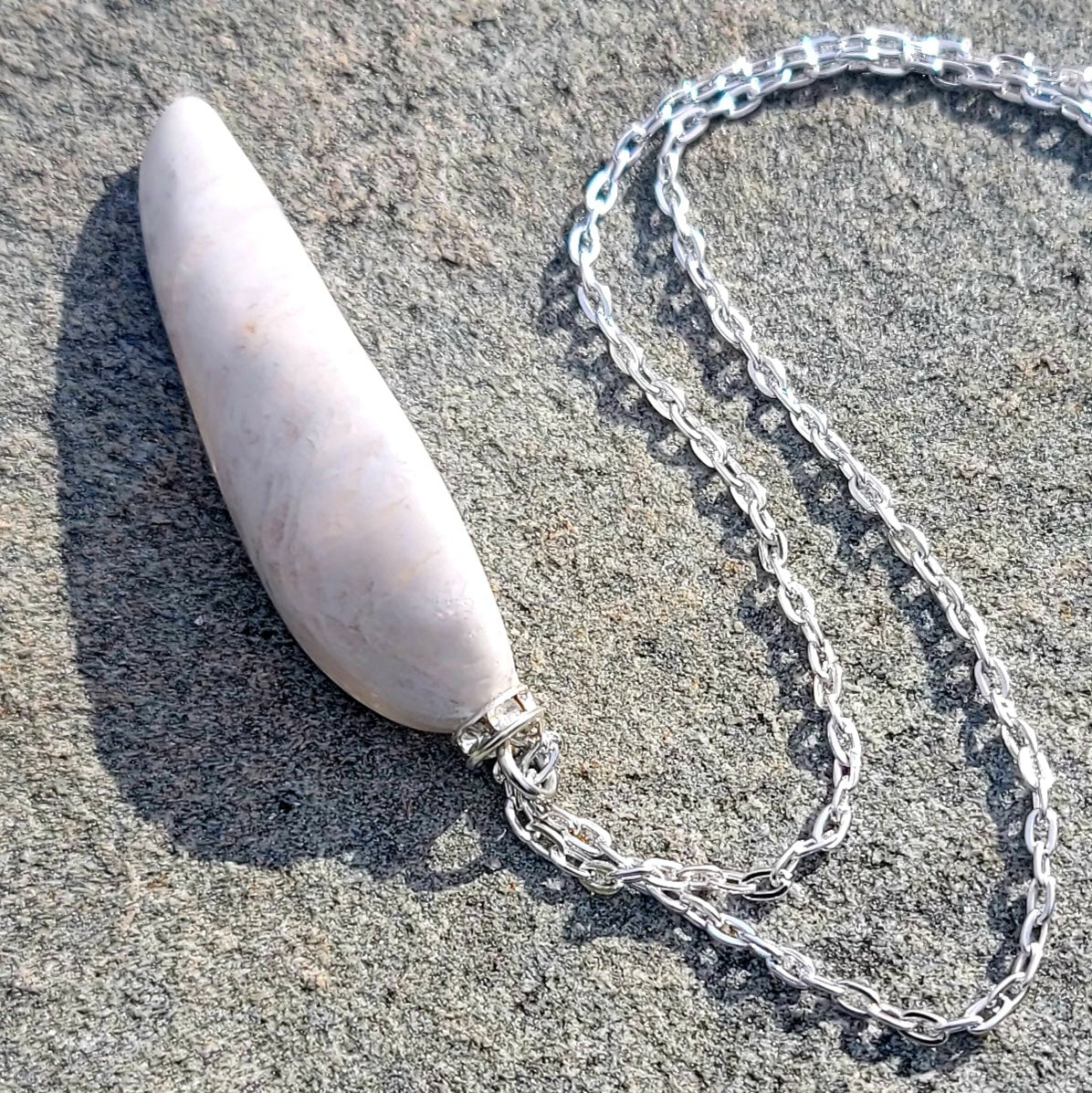 BOLD & BEAUTIFUL WHITE & CLEAR QUARTZ PENDANT.