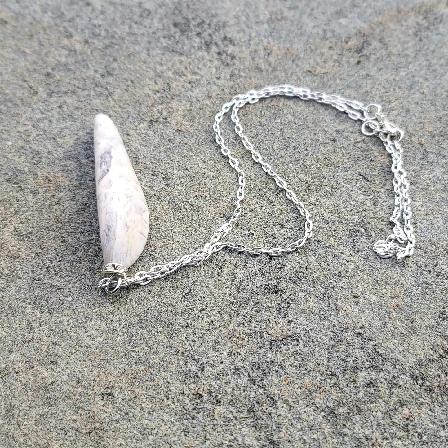 BOLD & BEAUTIFUL WHITE & CLEAR QUARTZ PENDANT.