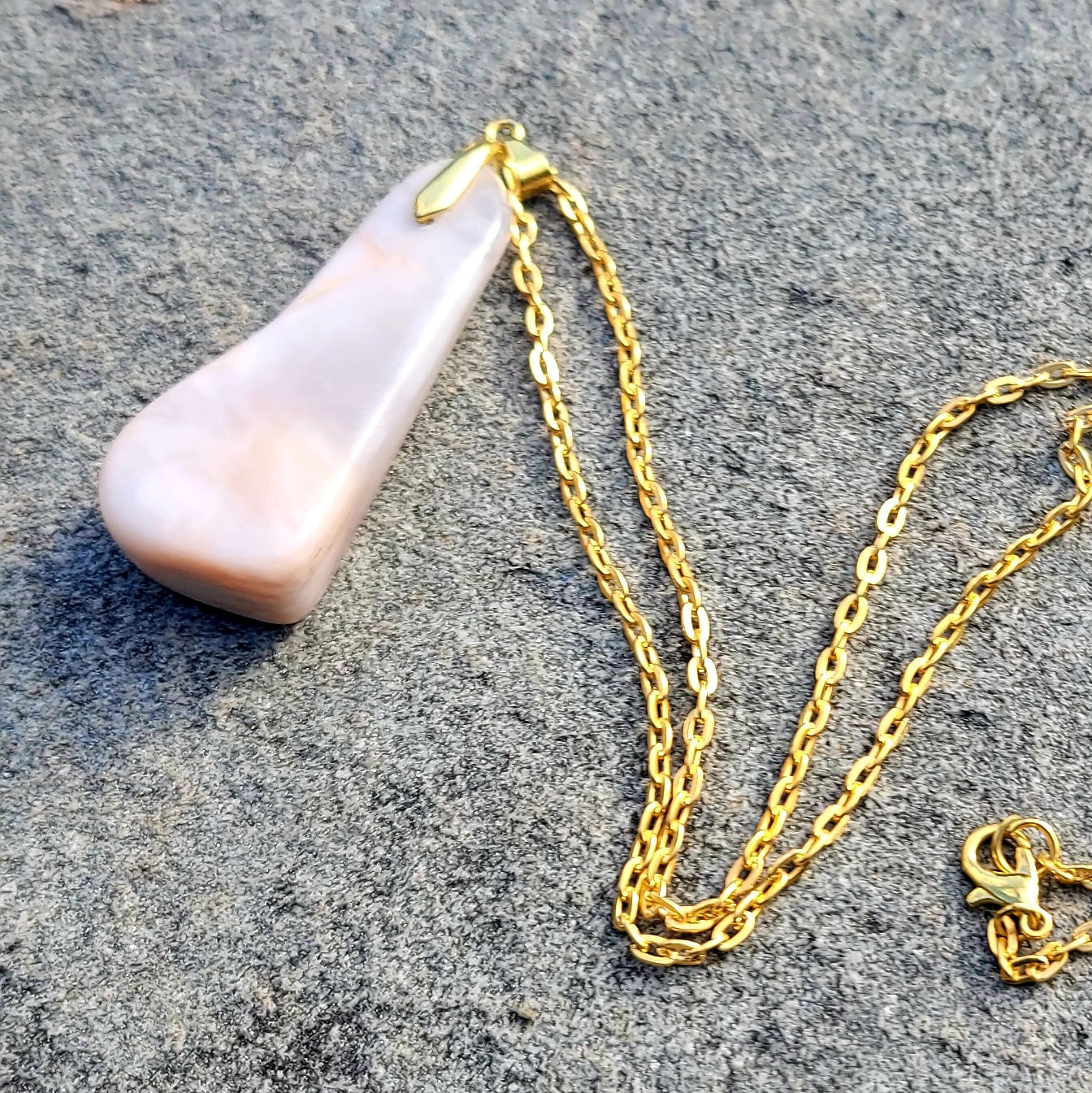 Elegant semi translucent pink milky quartz pendant. Perfect bold statement piece. Go ahead and make that statement without saying a word. If you prefer to be low-key, give it as a gift to that special someone...we have something else just for you!