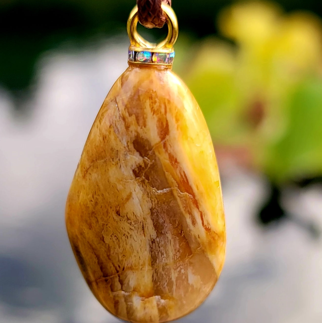 INSPIRING HEMATITE QUARTZ GEMSTONE PENDANT.