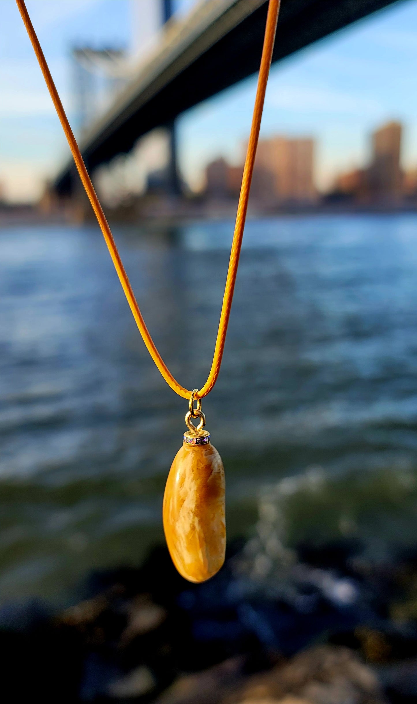 Golden Yellow quartz pendant. When you get this, take a good look into the stone and be amazed by the intricate patterns that were formed hundreds of thousands of years ago.