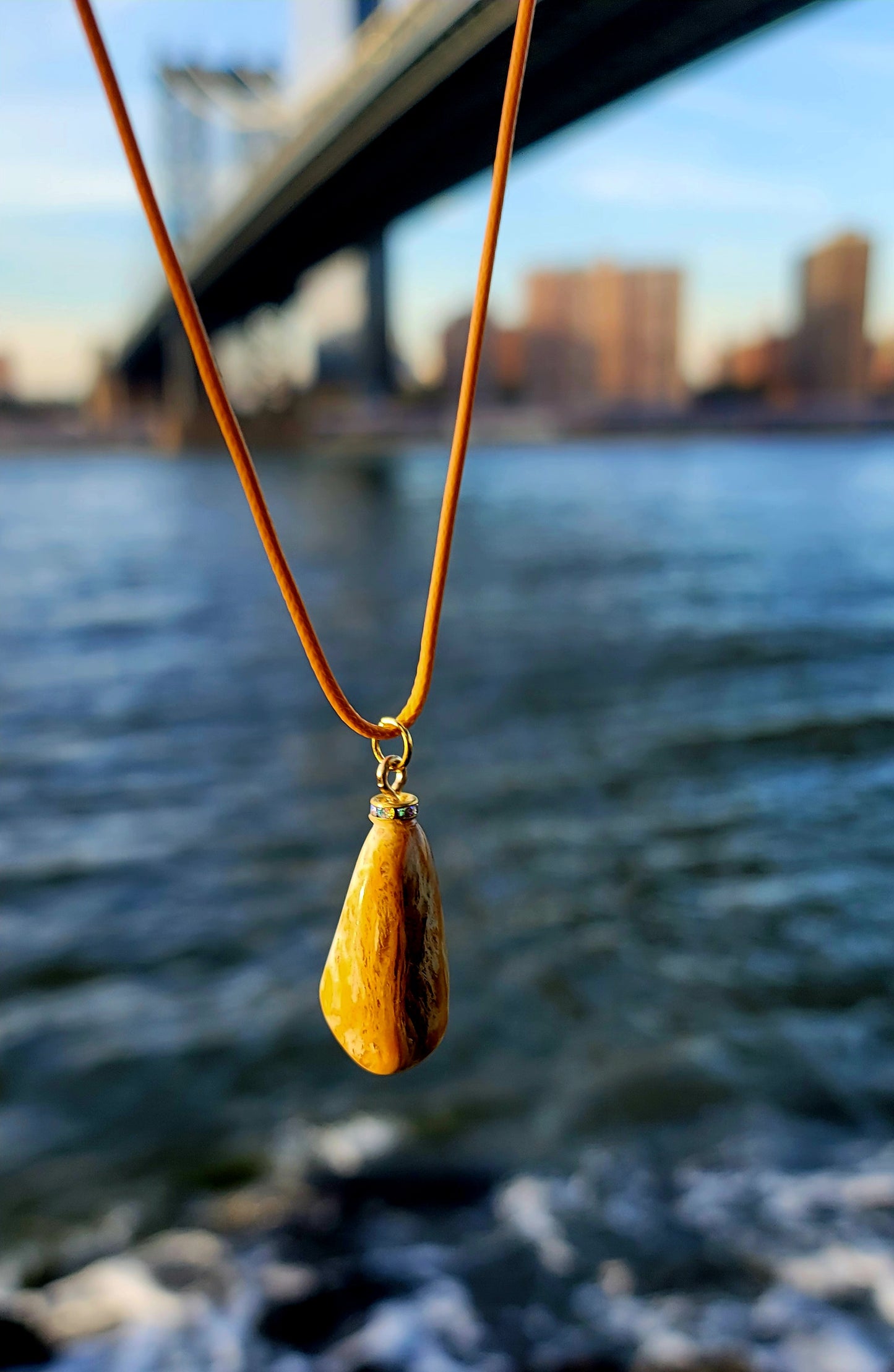 Golden Yellow quartz pendant. When you get this, take a good look into the stone and be amazed by the intricate patterns that were formed hundreds of thousands of years ago.