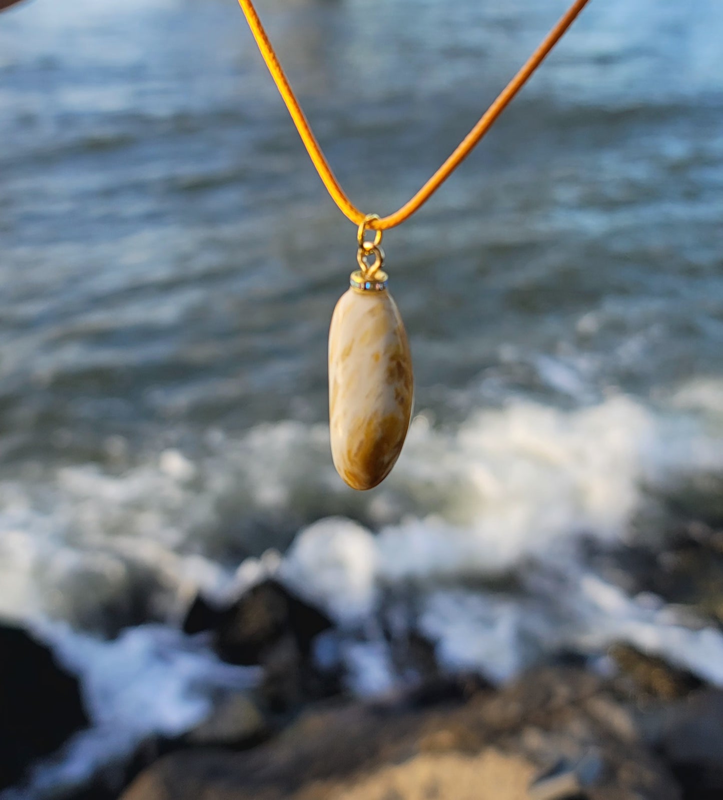 Golden Yellow quartz pendant. When you get this, take a good look into the stone and be amazed by the intricate patterns that were formed hundreds of thousands of years ago.