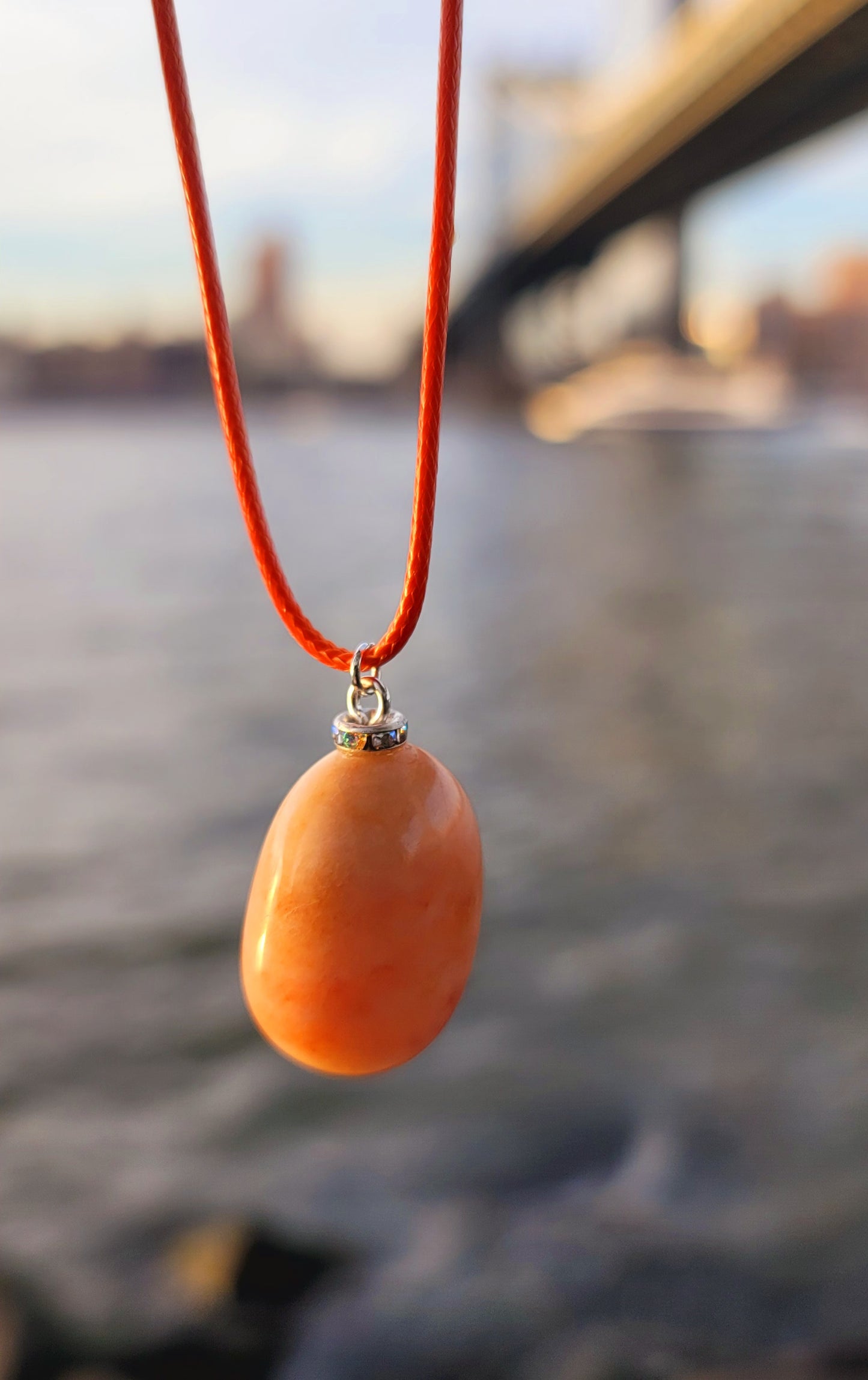 Orange quartz gemstone pendant. This aventurine based quartz piece is simple, straightforward and beautiful. great addition to your wardrobe, or to give as a gift.