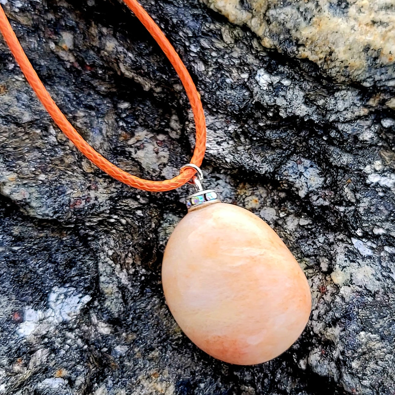 Orange quartz gemstone pendant. This aventurine based quartz piece is simple, straightforward and beautiful. great addition to your wardrobe, or to give as a gift.