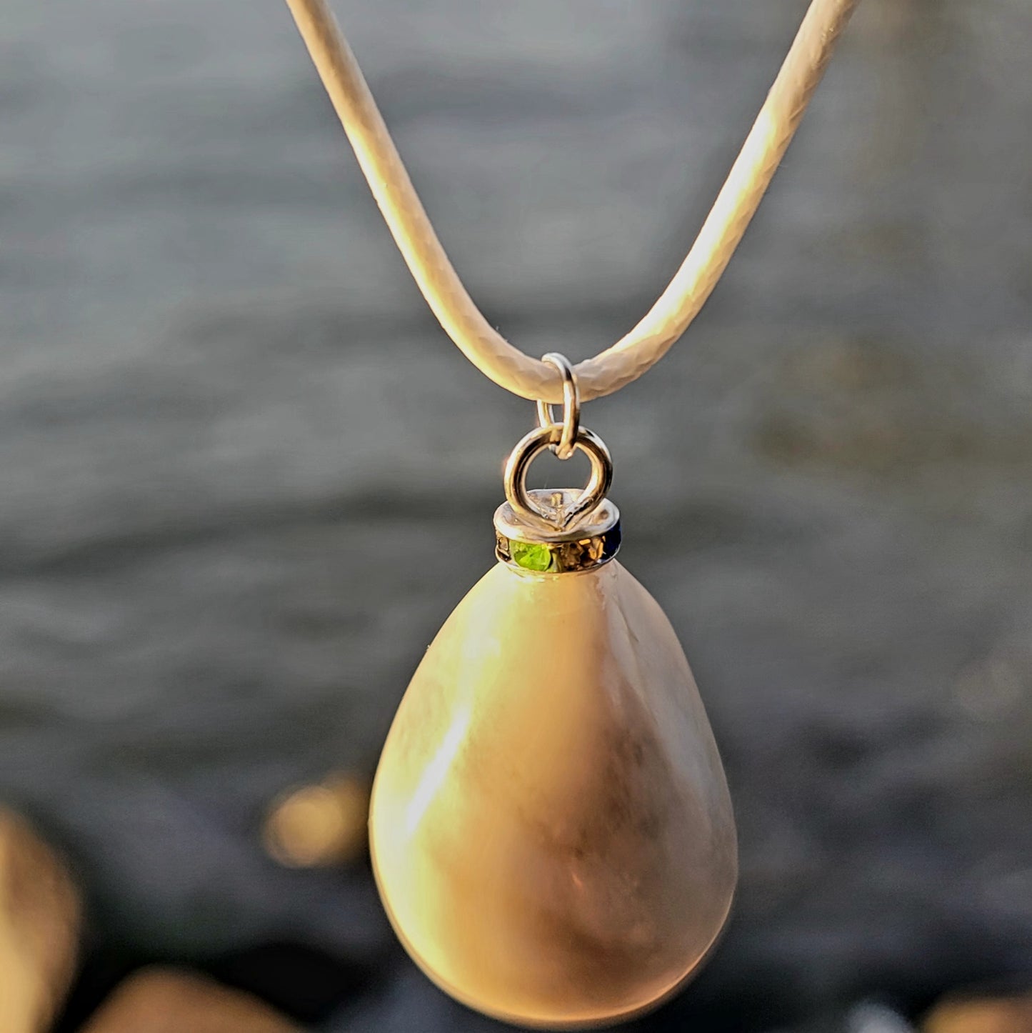 SLEEK MILKY QUARTZ PENDANT THAT IS AS VERSATILE AS A TUXEDO OR BLACK DRESS!