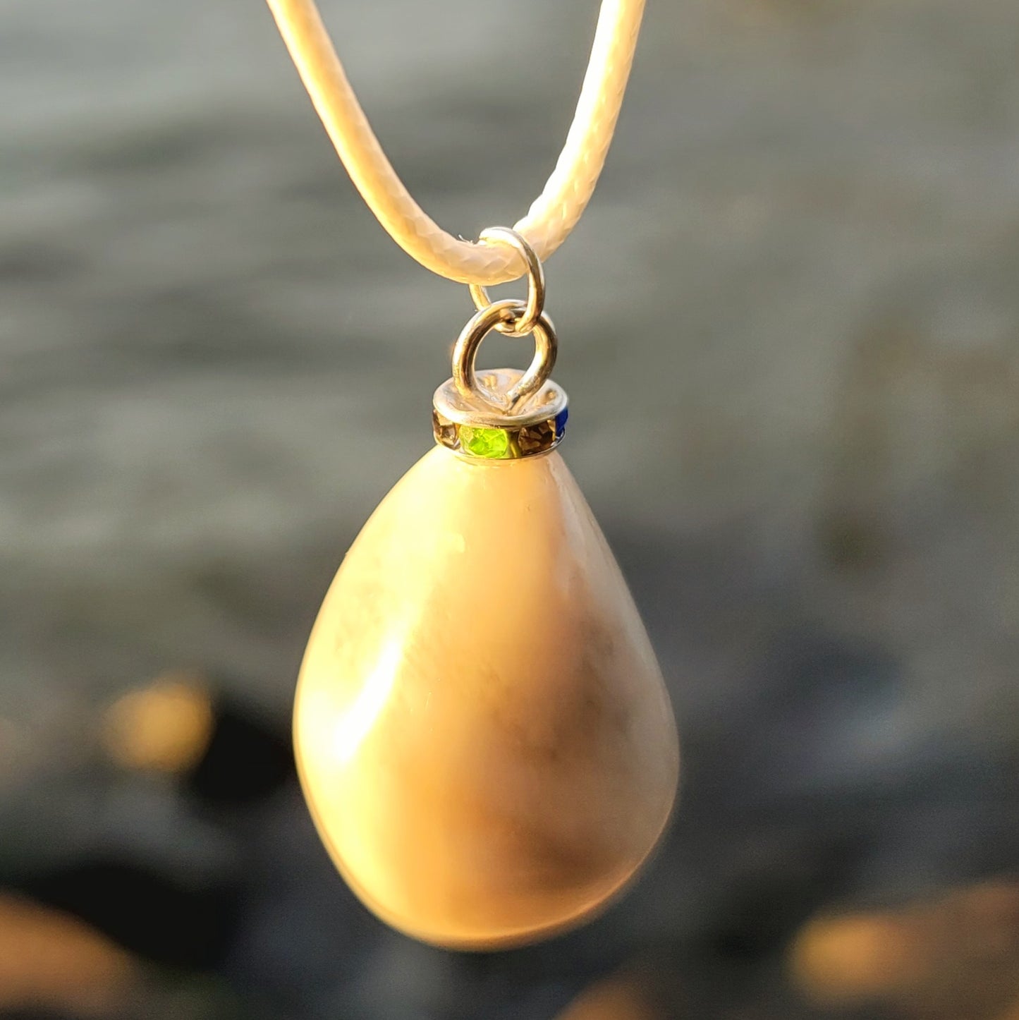 SLEEK MILKY QUARTZ PENDANT THAT IS AS VERSATILE AS A TUXEDO OR BLACK DRESS!