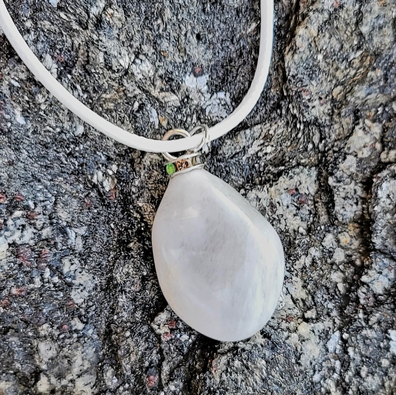 SLEEK MILKY QUARTZ PENDANT THAT IS AS VERSATILE AS A TUXEDO OR BLACK DRESS!