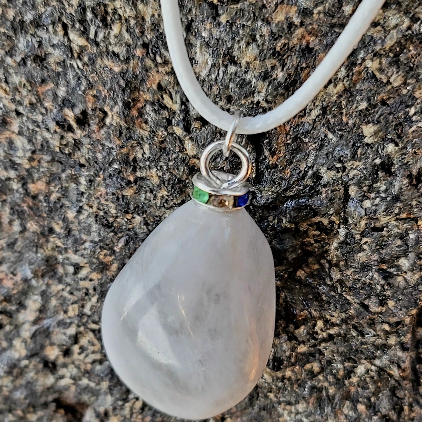 SLEEK MILKY QUARTZ PENDANT THAT IS AS VERSATILE AS A TUXEDO OR BLACK DRESS!