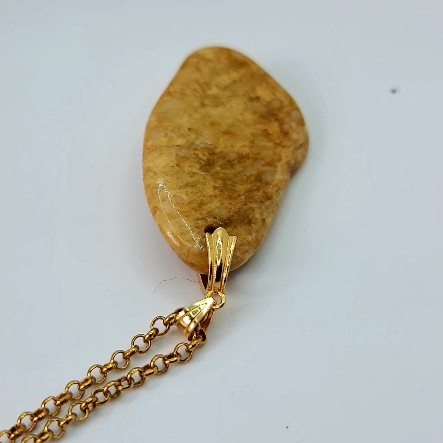 This Golden healer quartz pendant is the perfect piece to bring warmth and sunlight to you. Experience its power today.