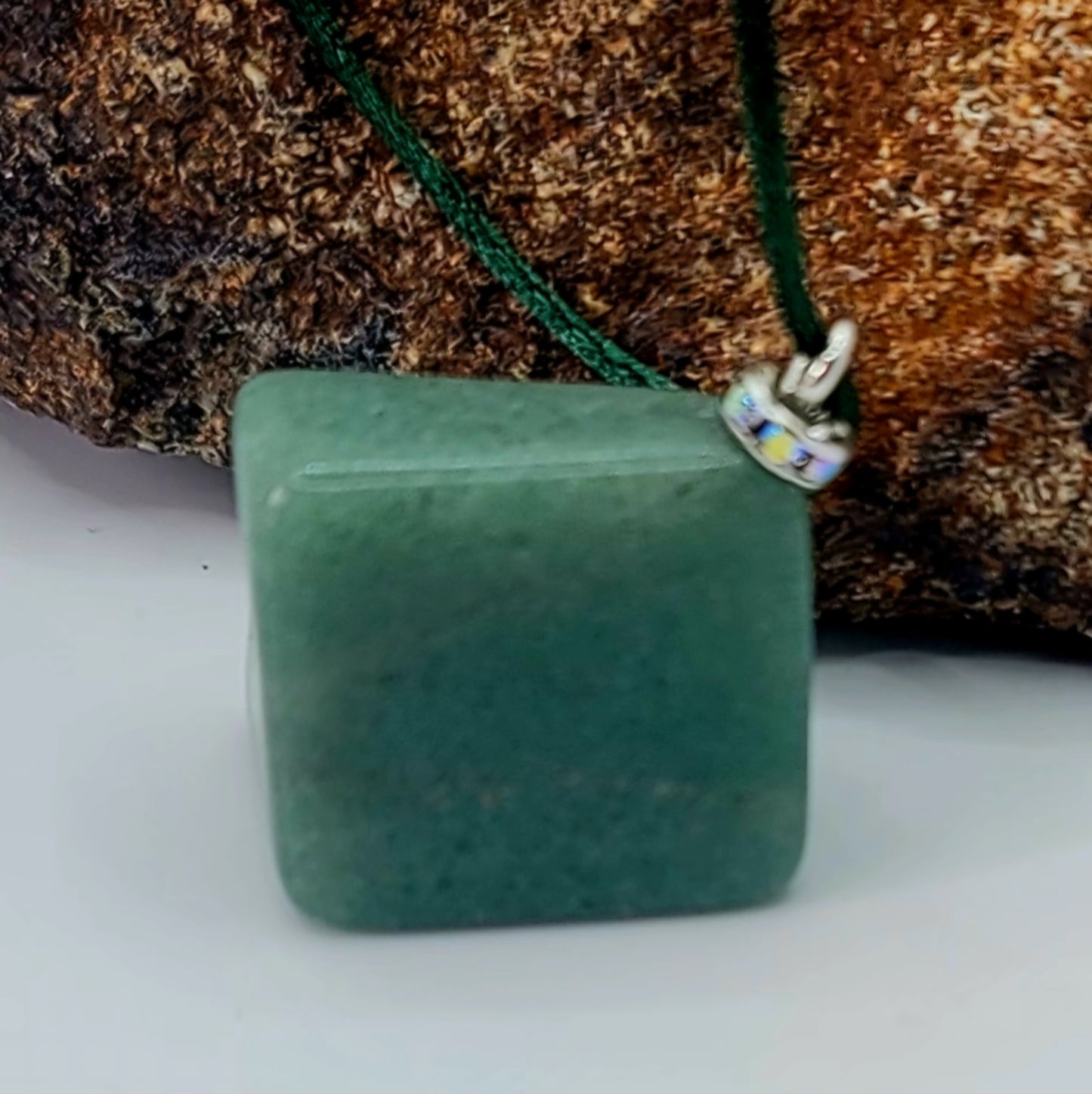 This Green Aventurine gemstone pendant is sure to delight with its features.