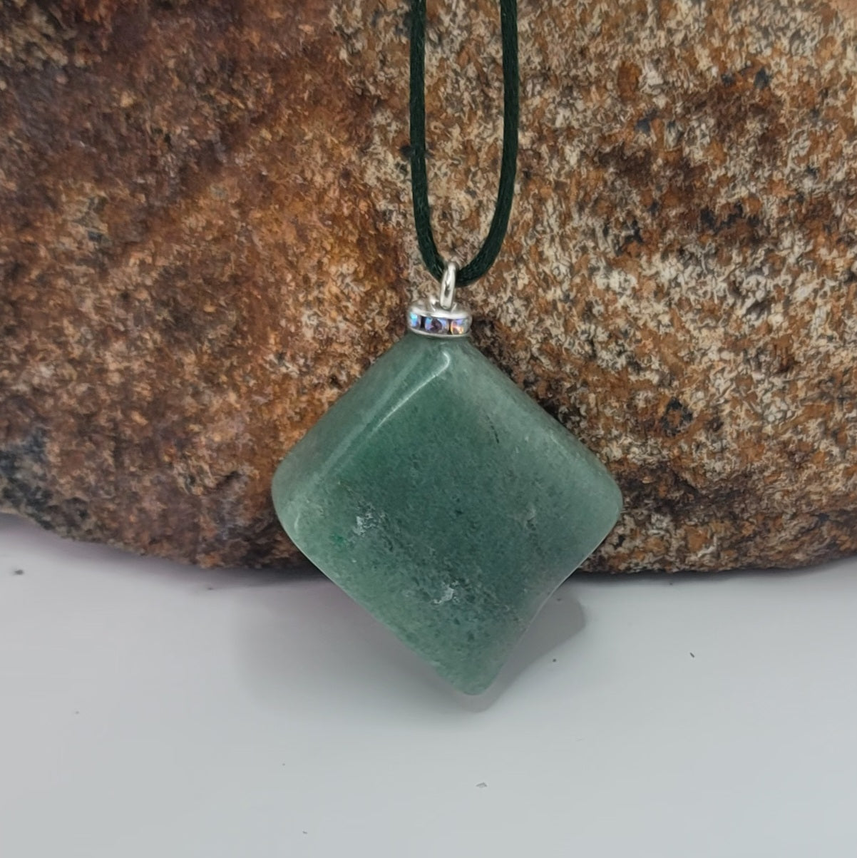 This Green Aventurine gemstone pendant is sure to delight with its features.