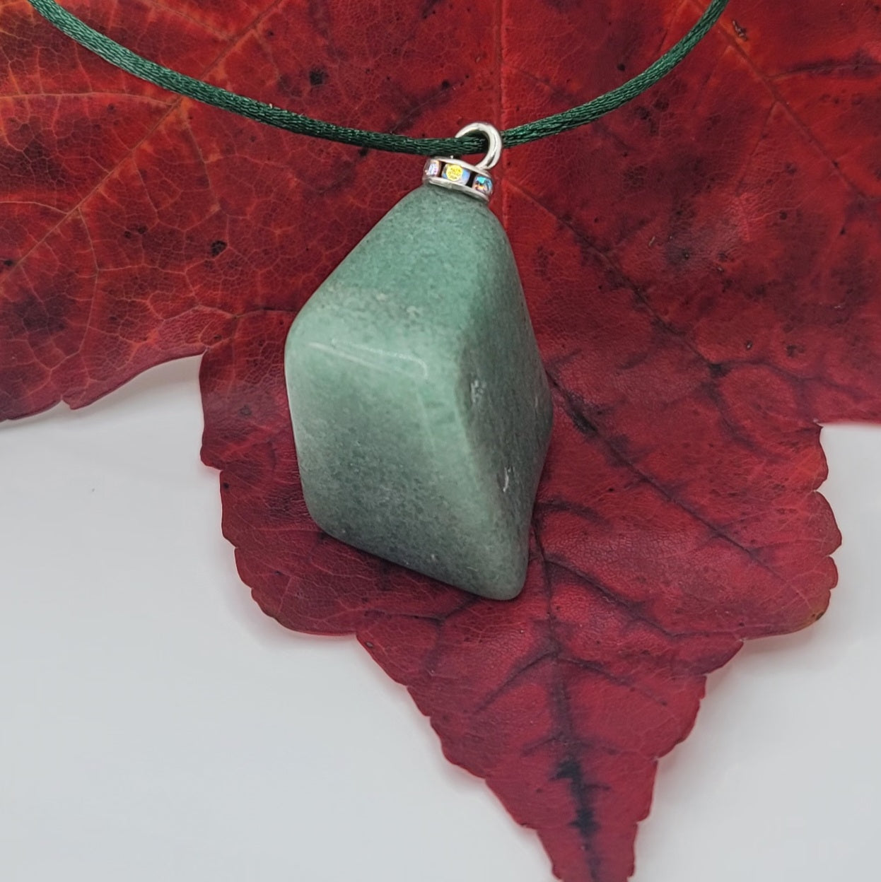 This Green Aventurine gemstone pendant is sure to delight with its features.