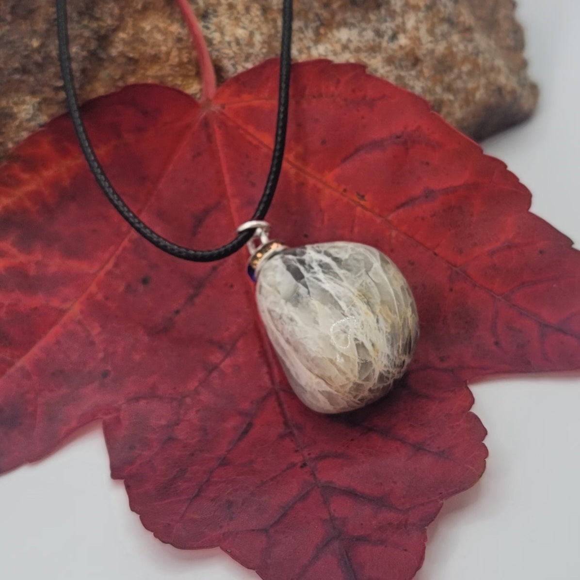 Check out this very unique Black Moonstone pendant. Its intricate array of banded lines makes for a fascinating gaze.