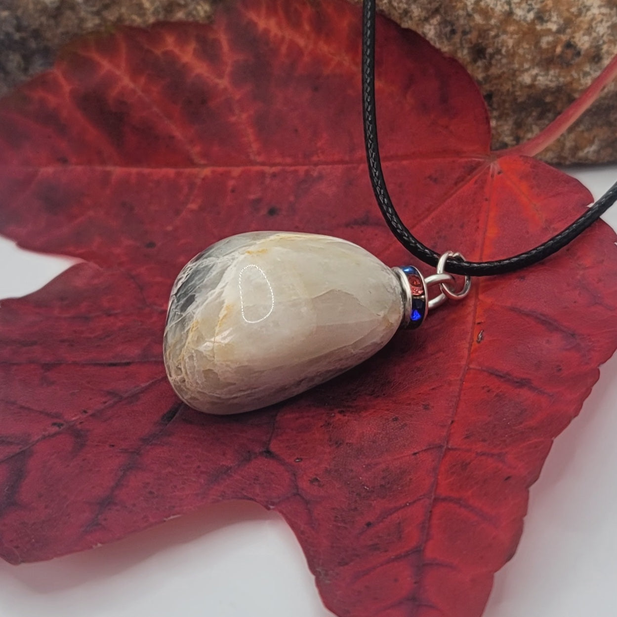 Check out this very unique Black Moonstone pendant. Its intricate array of banded lines makes for a fascinating gaze.