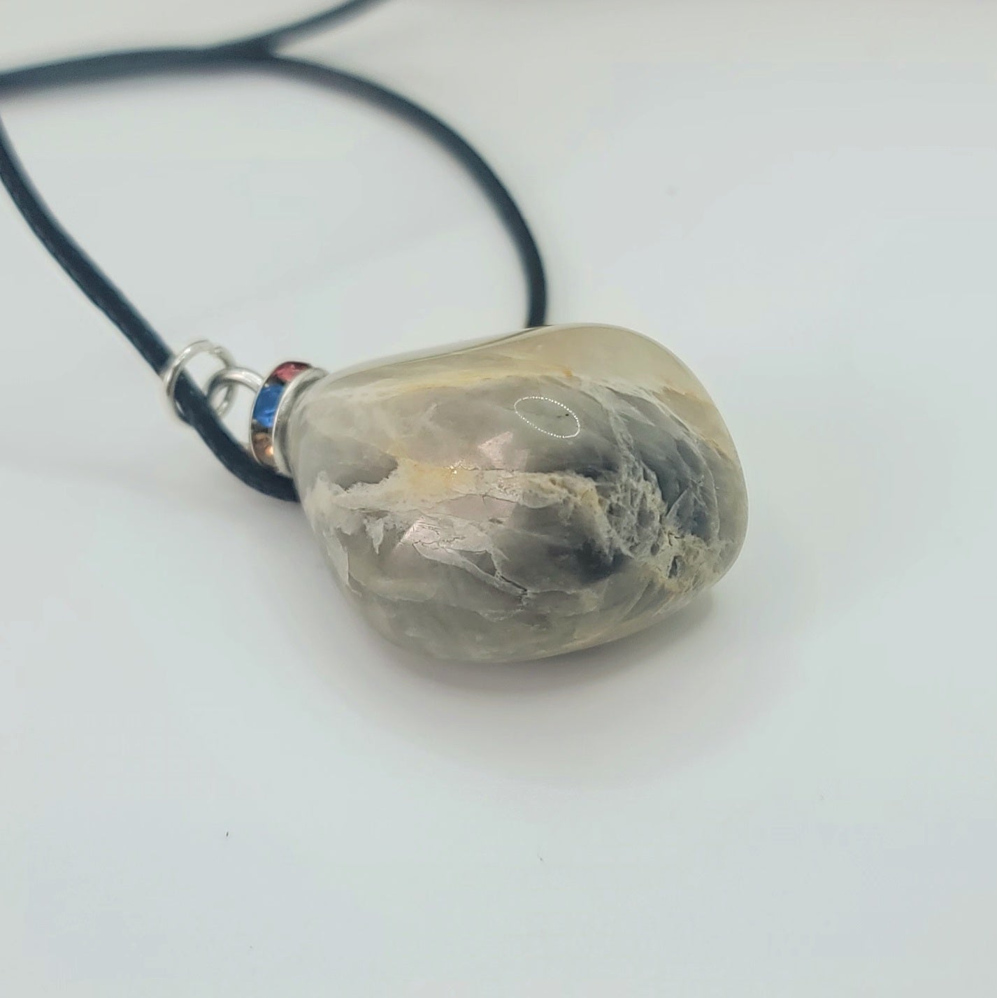 Check out this very unique Black Moonstone pendant. Its intricate array of banded lines makes for a fascinating gaze.