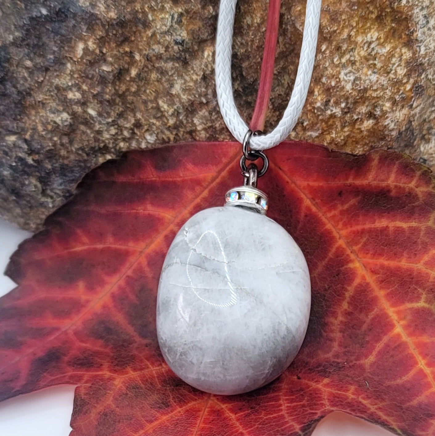 Make a simple but clear statement with this beautiful Grey and white quartz gemstone pendant. It's a wonderful piece to add to your collection or gift to someone this holiday and beyond.