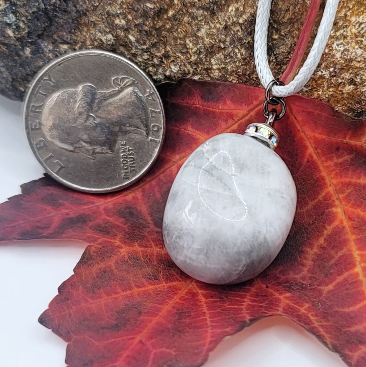 Make a simple but clear statement with this beautiful Grey and white quartz gemstone pendant. It's a wonderful piece to add to your collection or gift to someone this holiday and beyond.