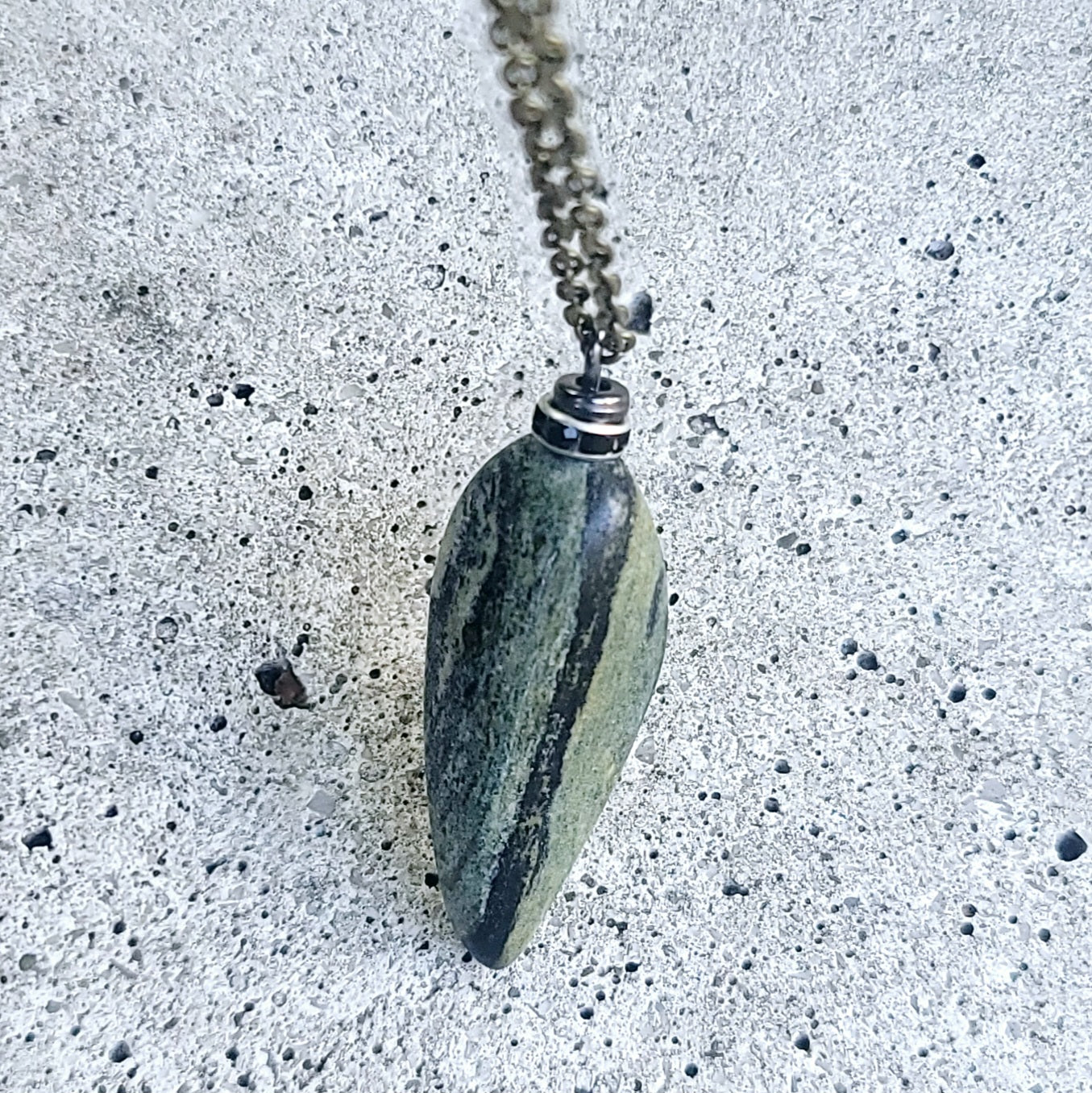 This elegant Serpentine pendant will astound you with the intricacies of its color formations. It shows mother nature at her artistic best. Delight in this piece for you only, or be generous and give it as a gift to someone unique and special to you.