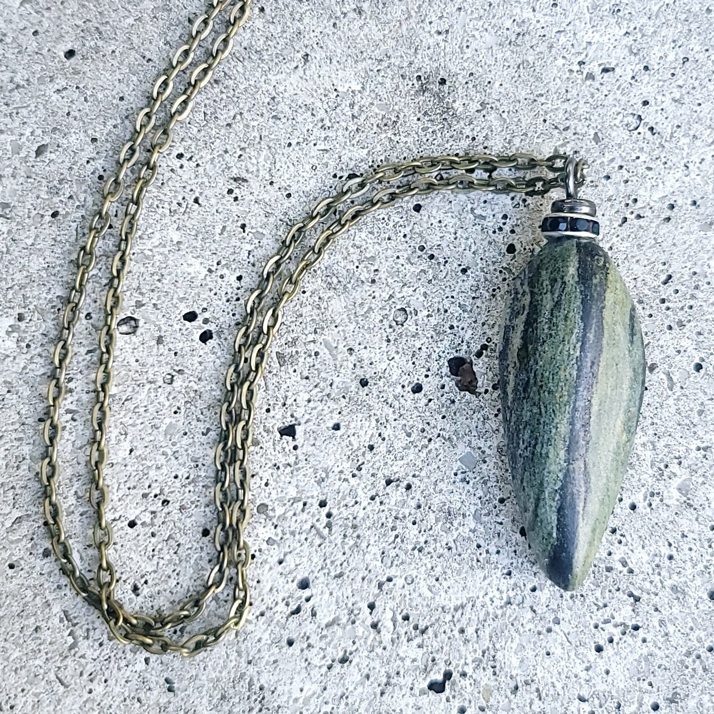 This elegant Serpentine pendant will astound you with the intricacies of its color formations. It shows mother nature at her artistic best. Delight in this piece for you only, or be generous and give it as a gift to someone unique and special to you.