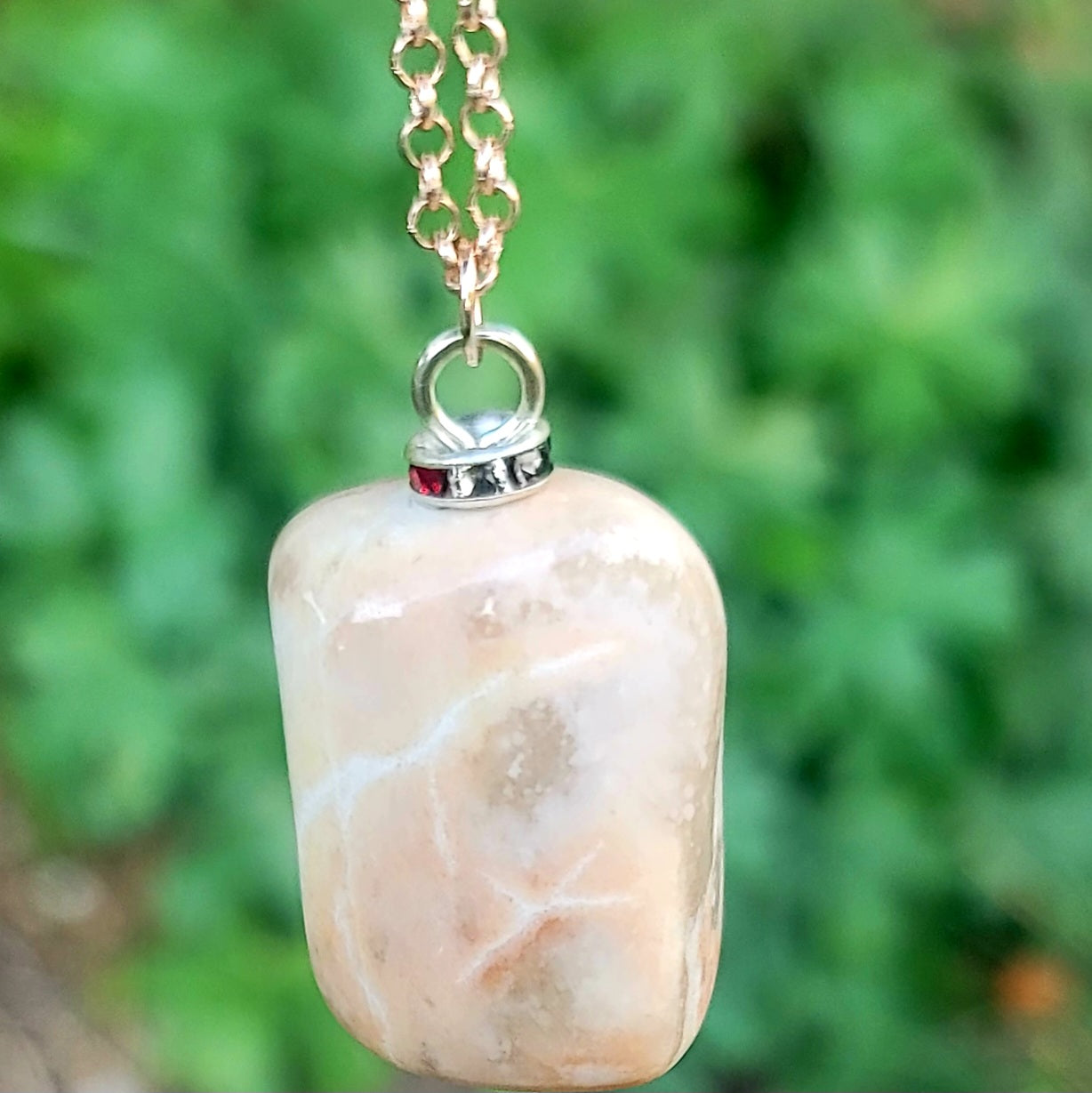 THIS BOLD, BLUSH, WHITE & CLEAR QUARTZ PENDANT HAS A VERY INTRIGUING APPEARANCE!