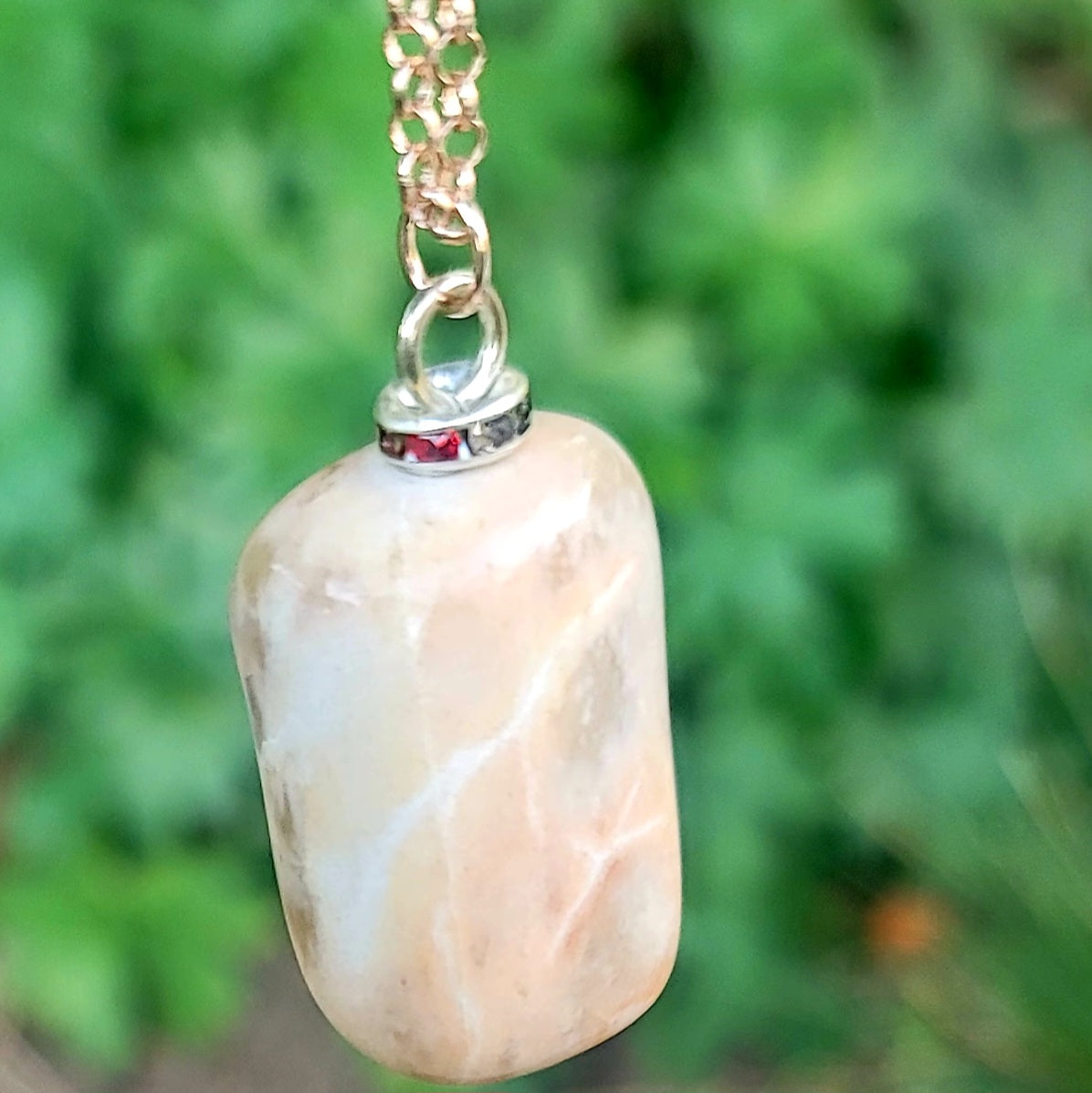 THIS BOLD, BLUSH, WHITE & CLEAR QUARTZ PENDANT HAS A VERY INTRIGUING APPEARANCE!