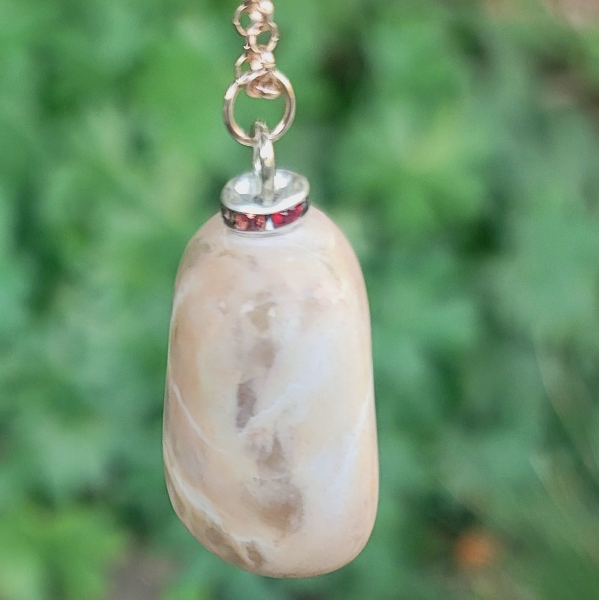 THIS BOLD, BLUSH, WHITE & CLEAR QUARTZ PENDANT HAS A VERY INTRIGUING APPEARANCE!