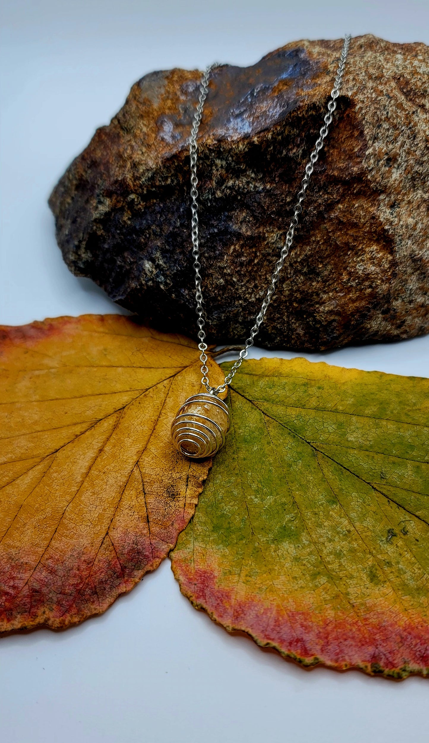 THIS IS A BEAUTIFUL GOLDEN QUARTZ SPIRAL CAGE NECKLACE