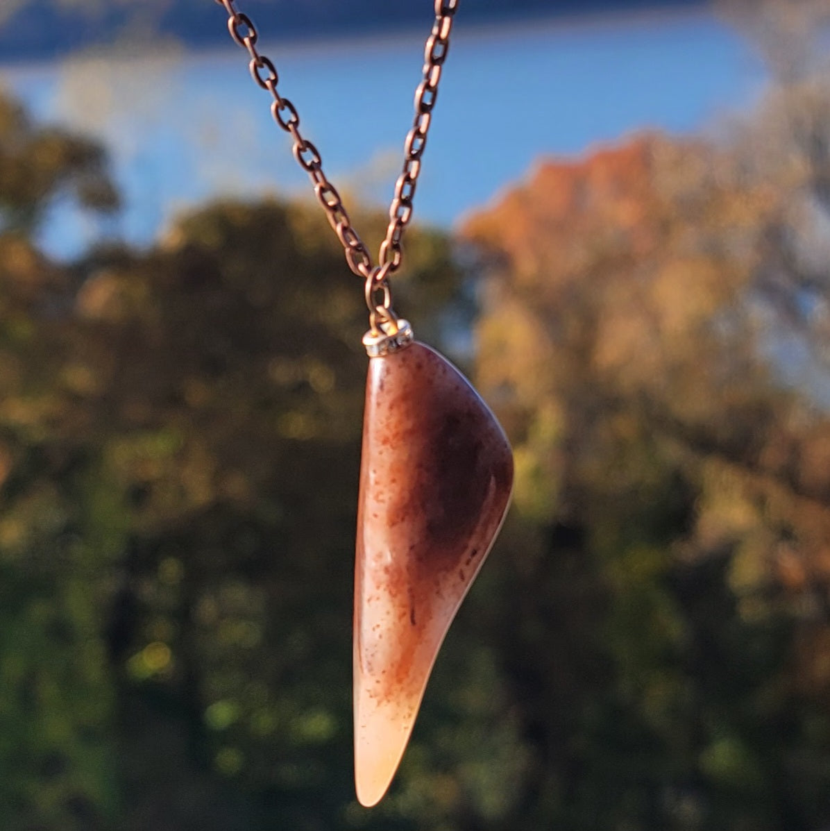 This highly distinctive Ferruginous Quartz Pendant is the perfect gift for the special someone in your life