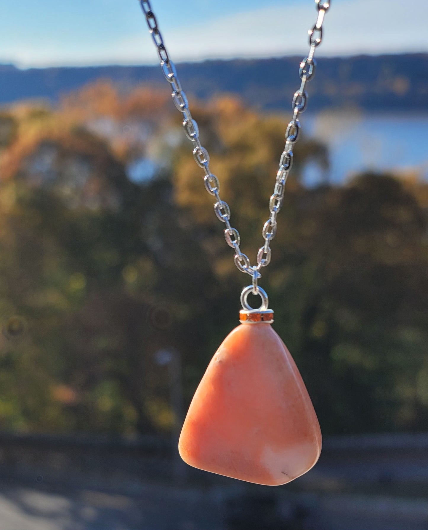 THIS ROSE/PINK/WHITE AVENTURINE PENDANT ILLUSTRATES THE BEAUTY OF MOTHER NATURE.