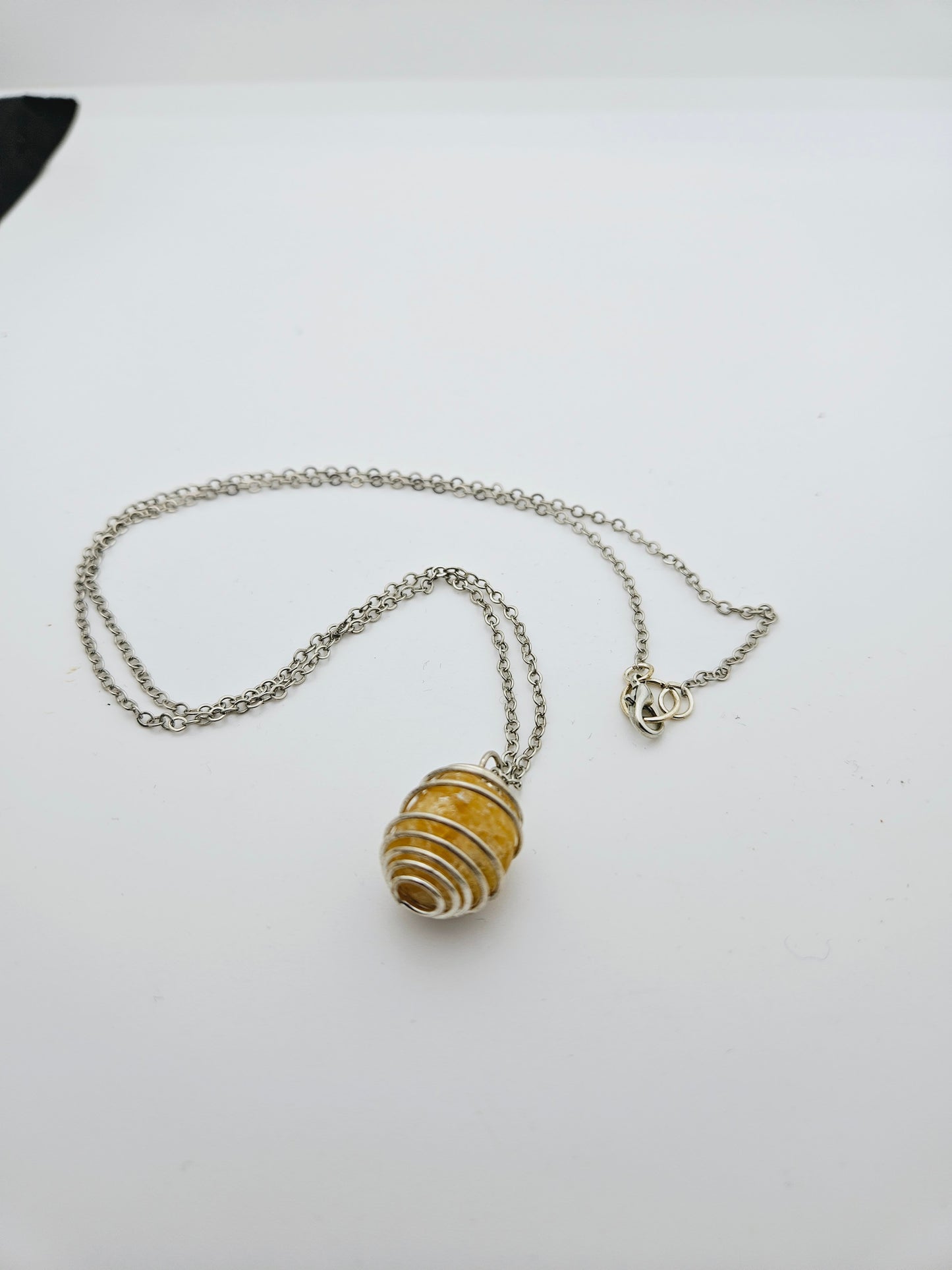 THIS IS A BEAUTIFUL GOLDEN QUARTZ SPIRAL CAGE NECKLACE