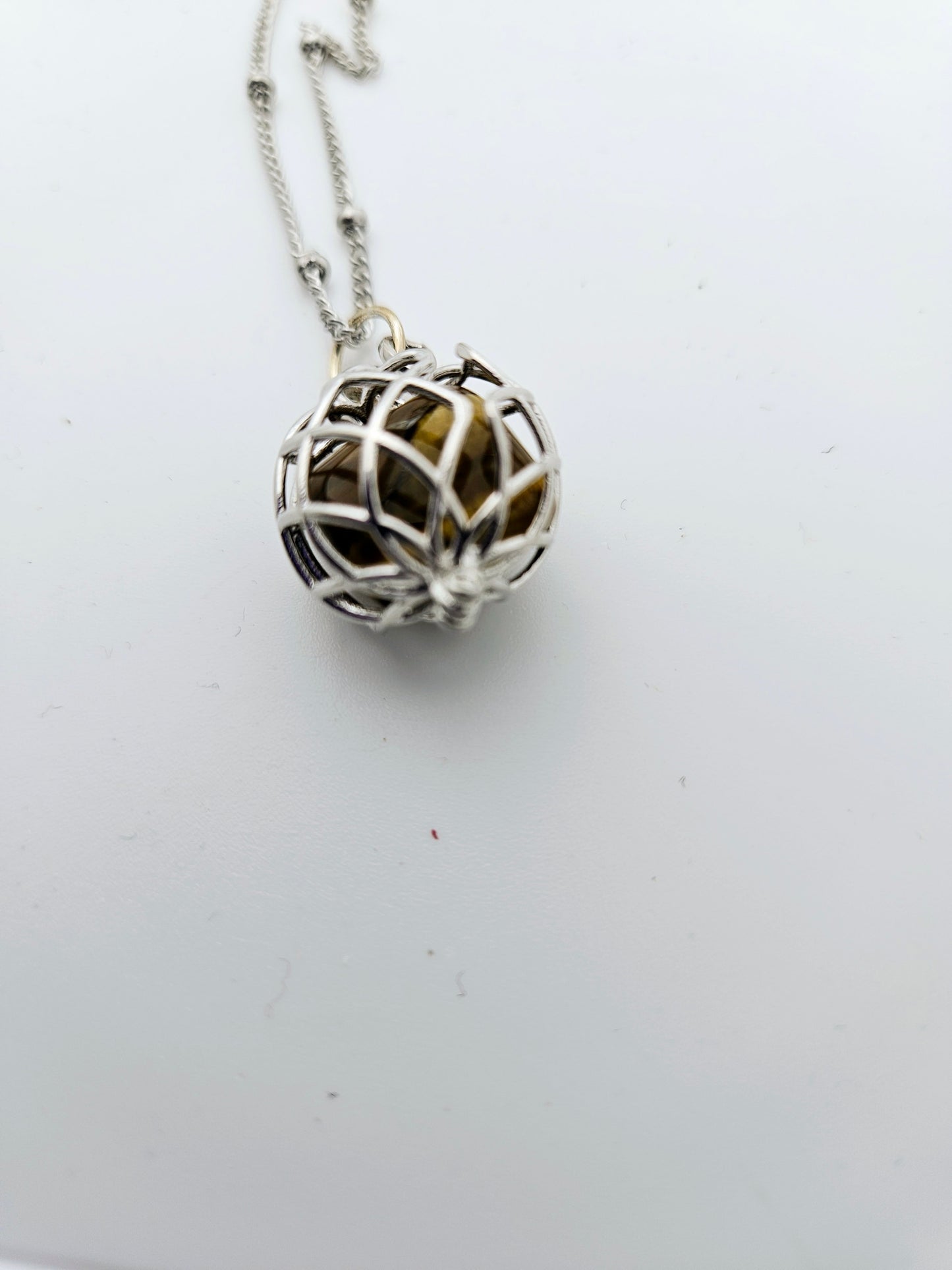 CAGED TIGER'S EYE PENDANT NECKLACE.