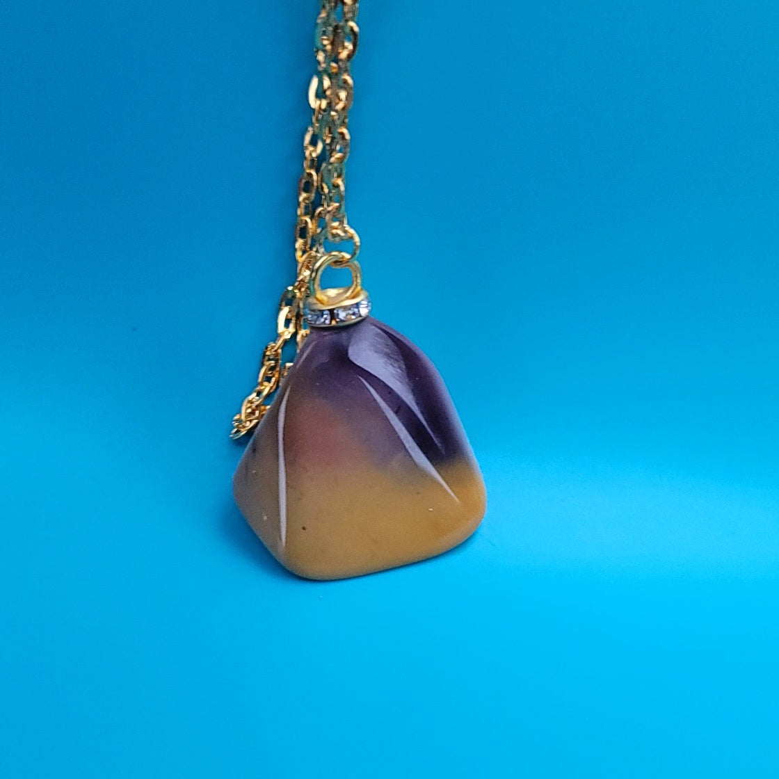 Cool Desert Jasper Pendant with a vibrant color pattern and shape. You will absolutely love this piece.