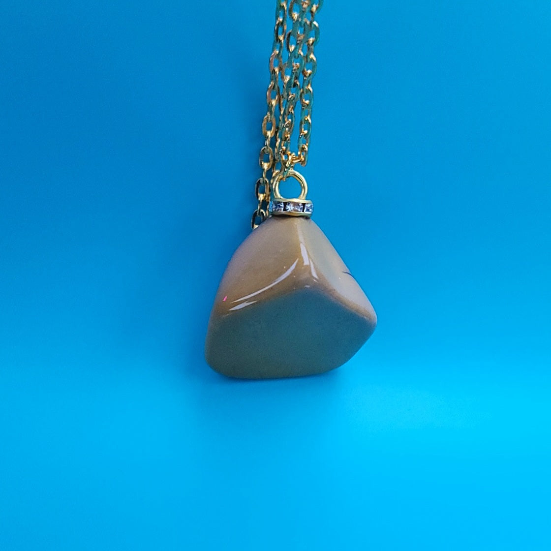 Cool Desert Jasper Pendant with a vibrant color pattern and shape. You will absolutely love this piece.