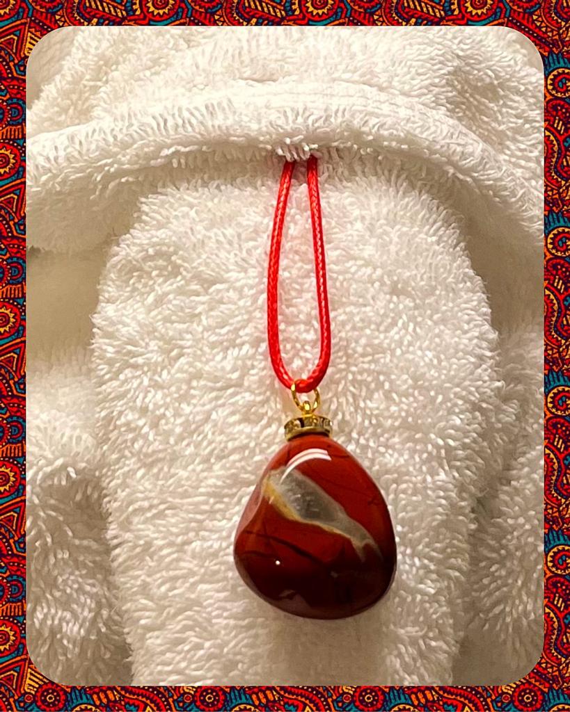 STUNNING RED JASPER PENDANT. MAKE A SPLASH OR GIVE AS A MEMORABLE GIFT.