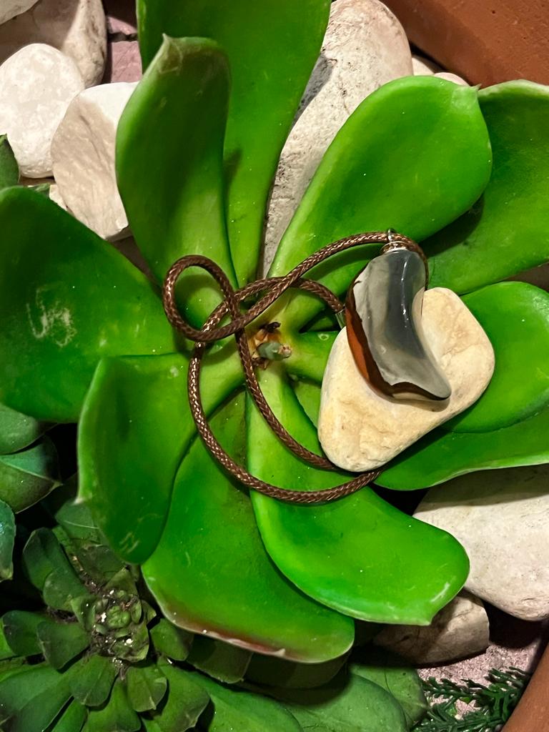 Striking Desert Jasper pendant with contrasting greys and brown. This pendant is surely a head turner. Get as a gift or addition to your collection