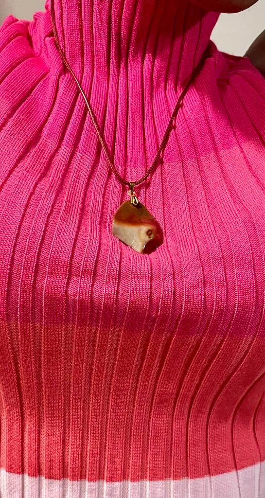 AN EXQUISITE DESERT JASPER PENDANT that is super unique in shape and color. Be amazed by the Uniqueness of this Pendant. You are sure to be the center of the conversation with this piece!!