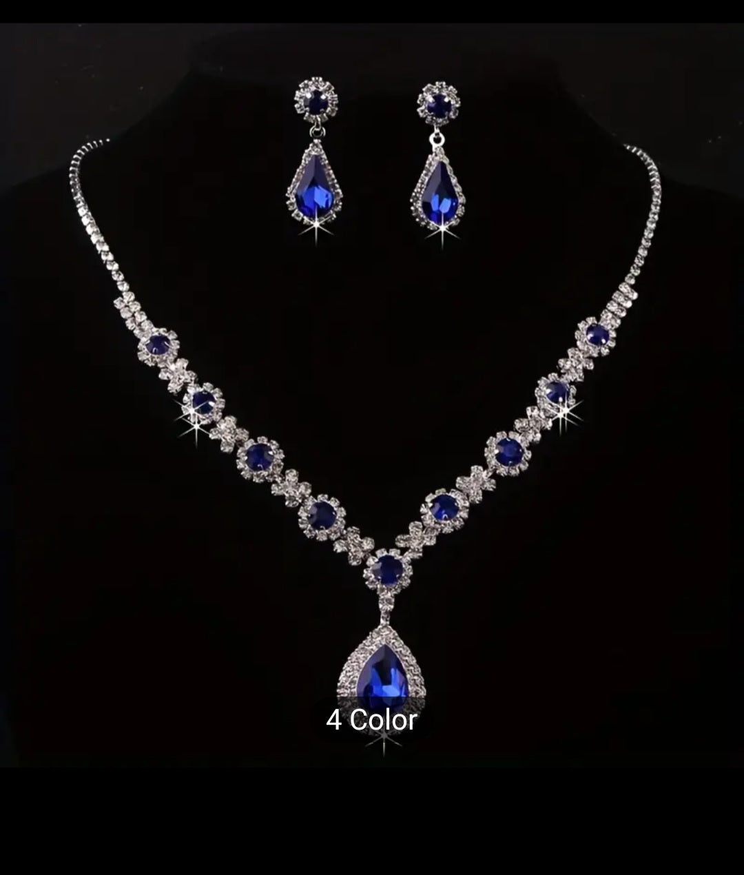 SPARKLINGLY ELEGANT RHINESTONE NECKLACE AND EARRING SET.