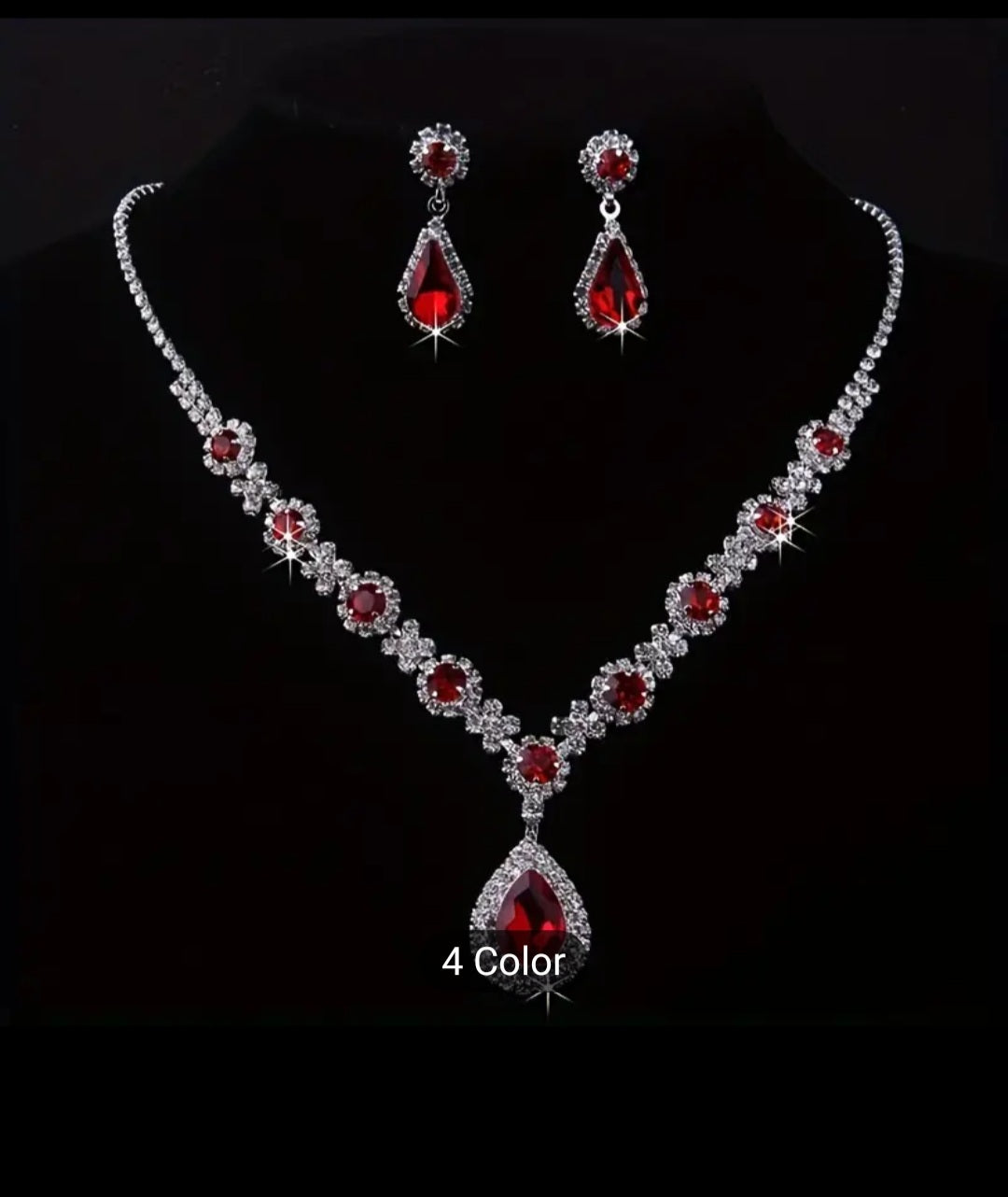 SPARKLINGLY ELEGANT RHINESTONE NECKLACE AND EARRING SET.