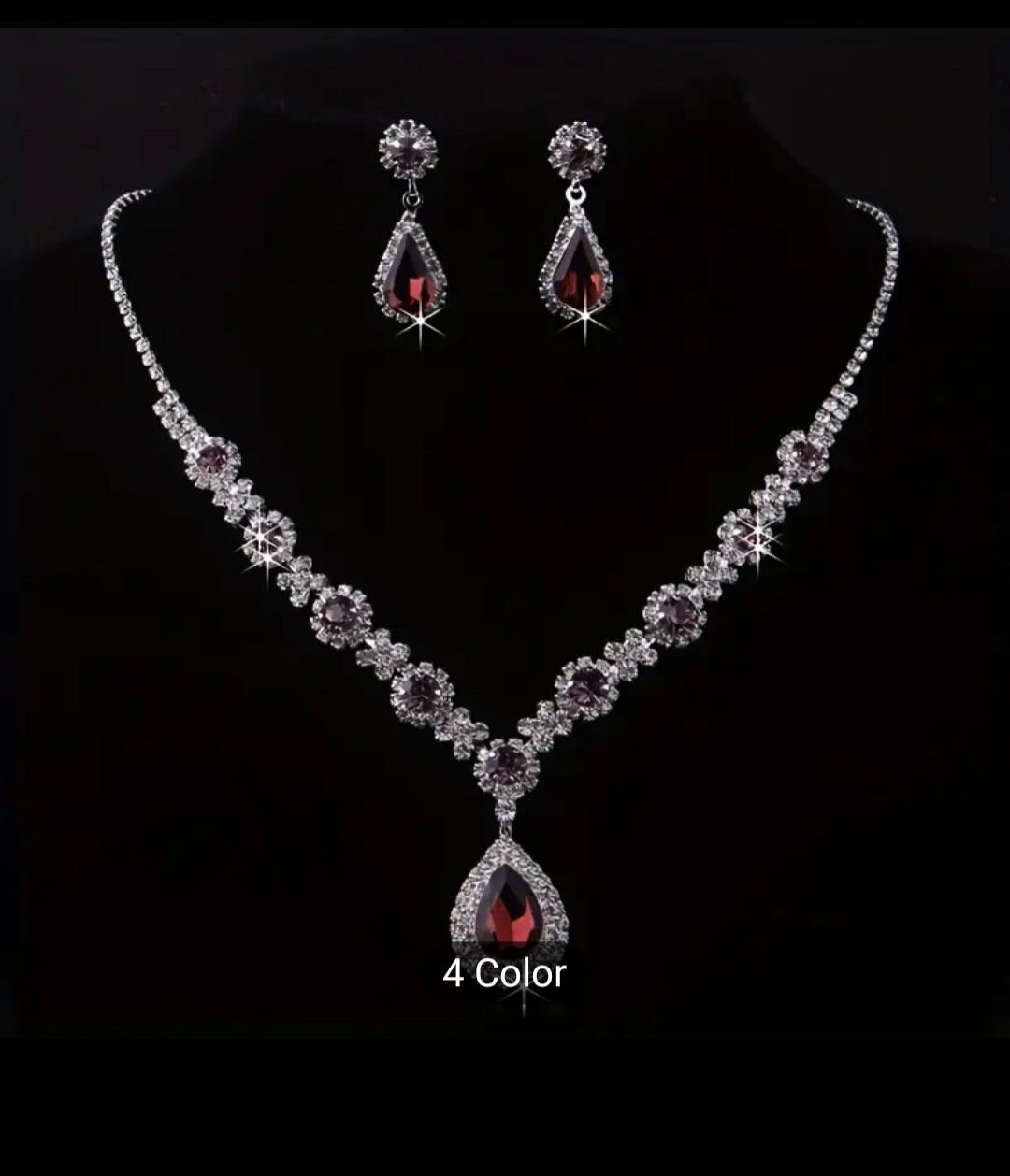 SPARKLINGLY ELEGANT RHINESTONE NECKLACE AND EARRING SET.