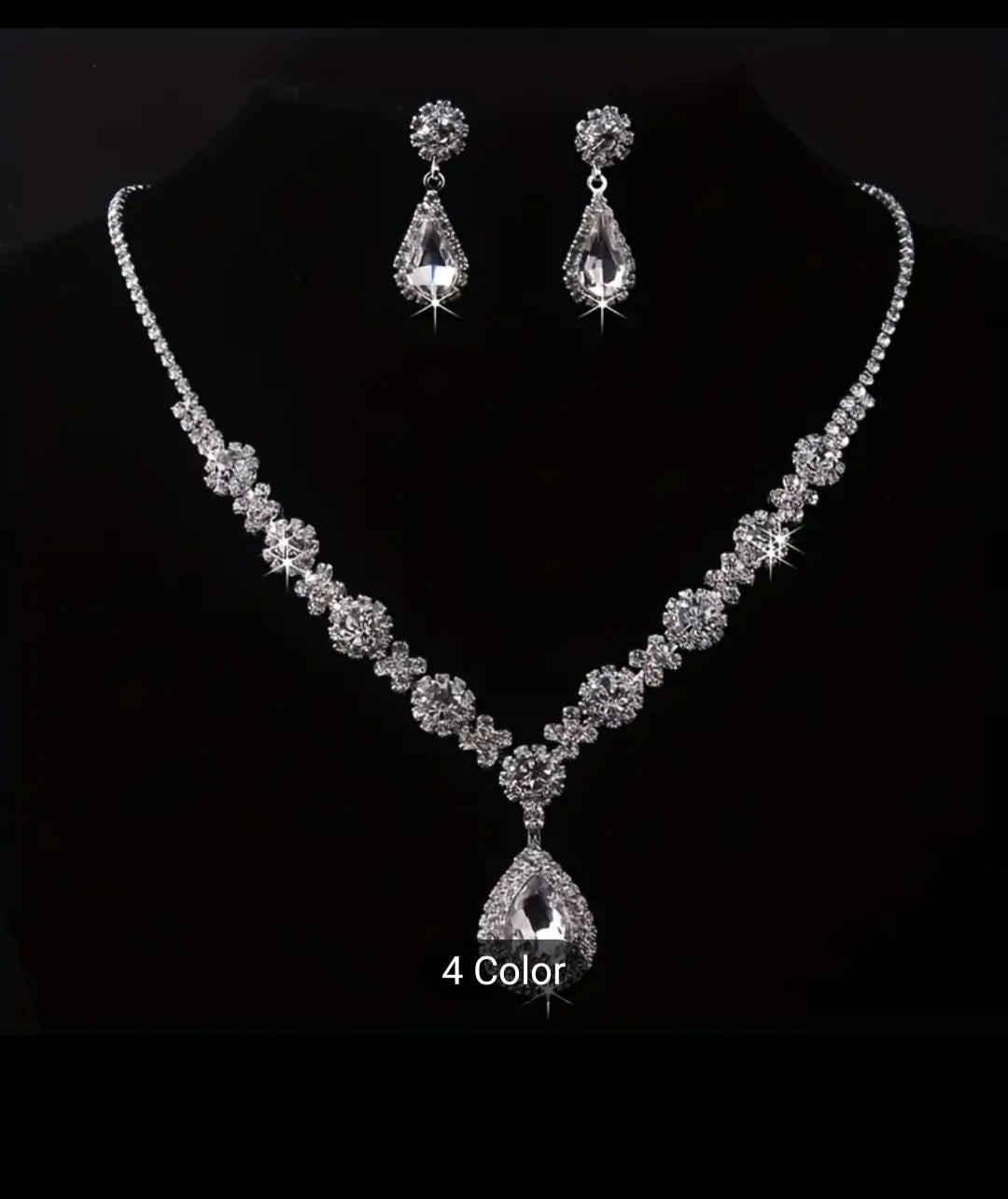 SPARKLINGLY ELEGANT RHINESTONE NECKLACE AND EARRING SET.