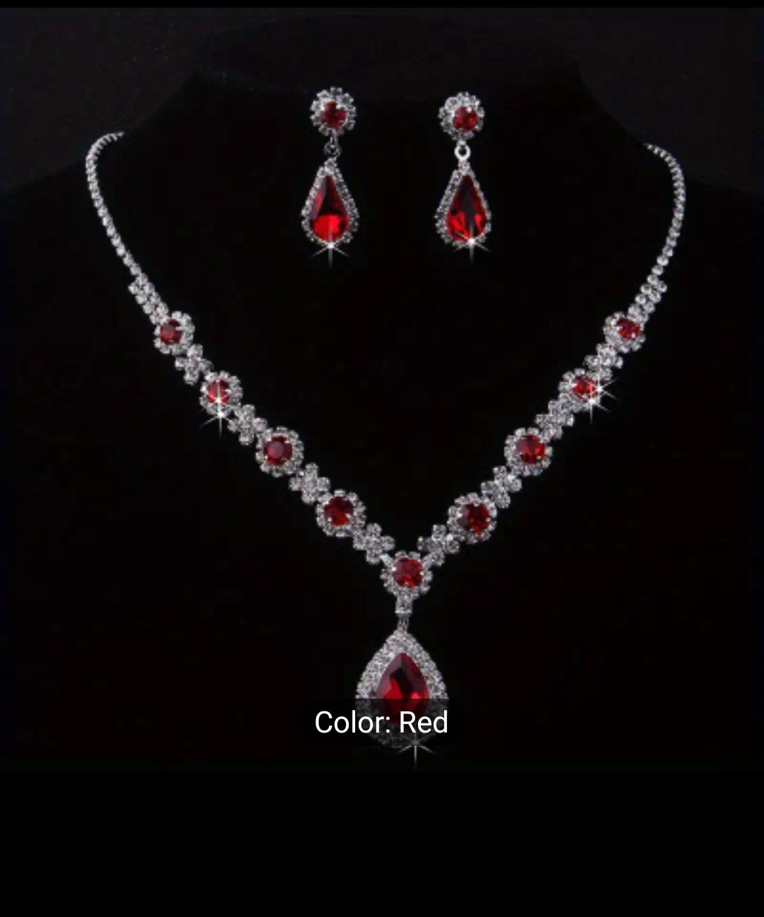 SPARKLINGLY ELEGANT RHINESTONE NECKLACE AND EARRING SET.