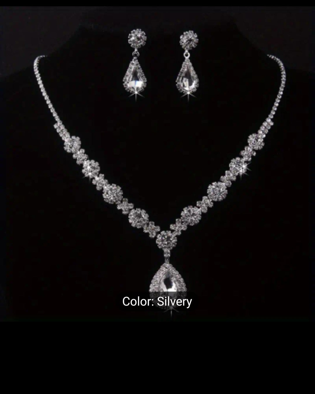 SPARKLINGLY ELEGANT RHINESTONE NECKLACE AND EARRING SET.