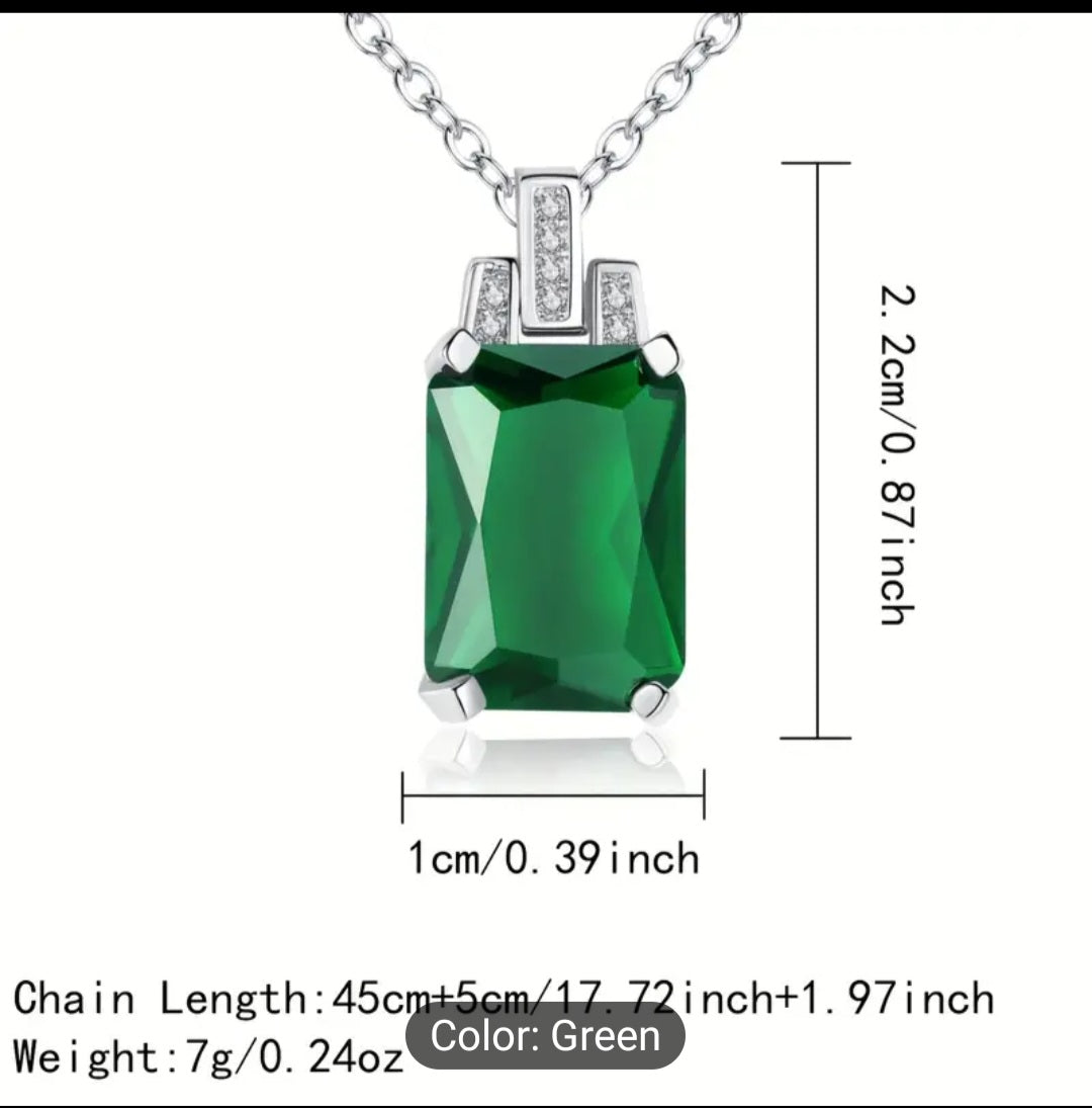 A Luxurious green baguette Zircon necklace that is trimmed all around with plated silver, including a plated silver chain. This is a fashion piece that is stylish and affordable. A perfect gift for her.