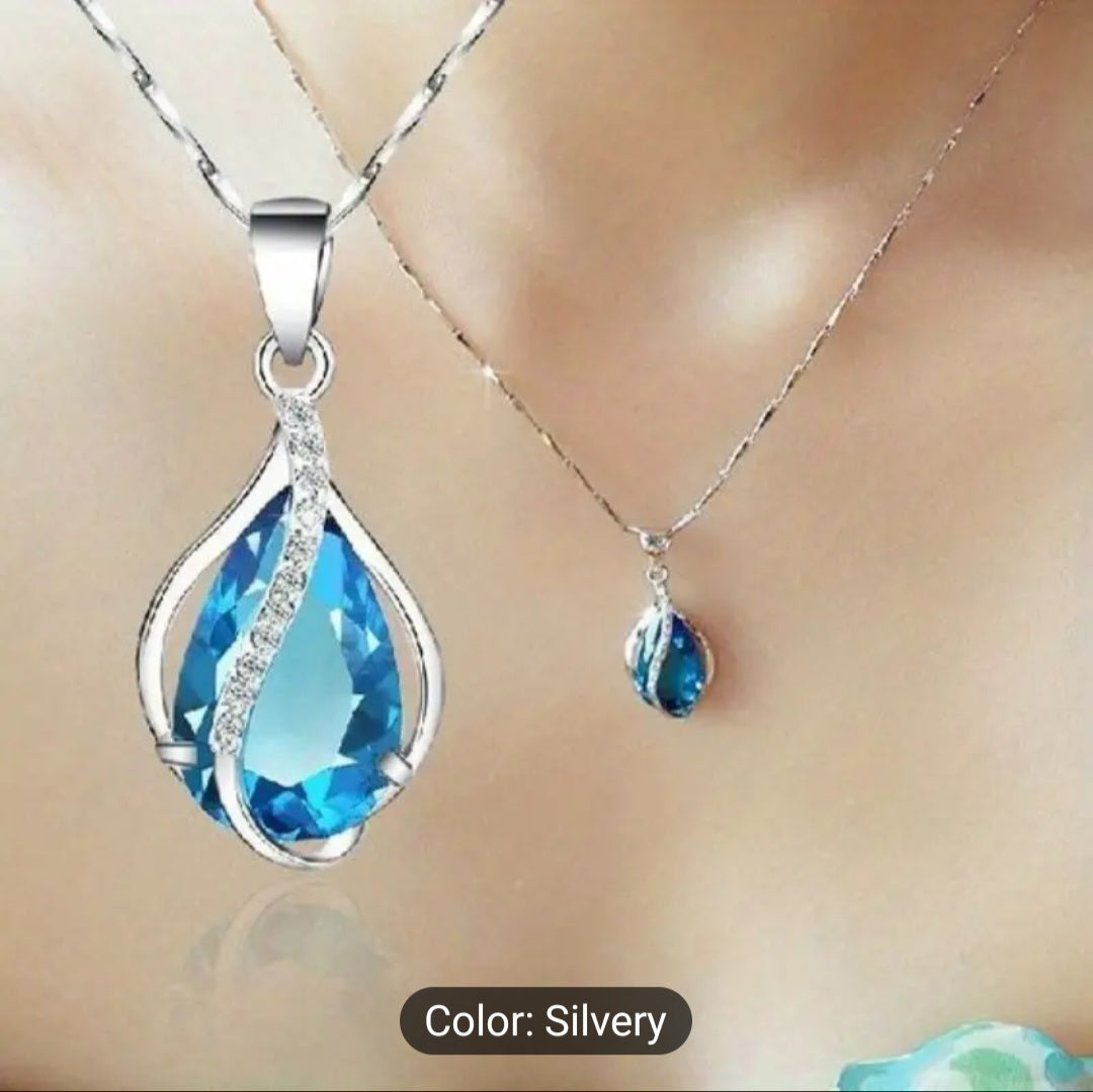 Captivating teardrop cut aquamarine gemstone. This 925-sterling silver piece is delicately balanced between luxury and simplicity. The perfect gift for that special person or special occasion. Treat yourself to something tasteful! l